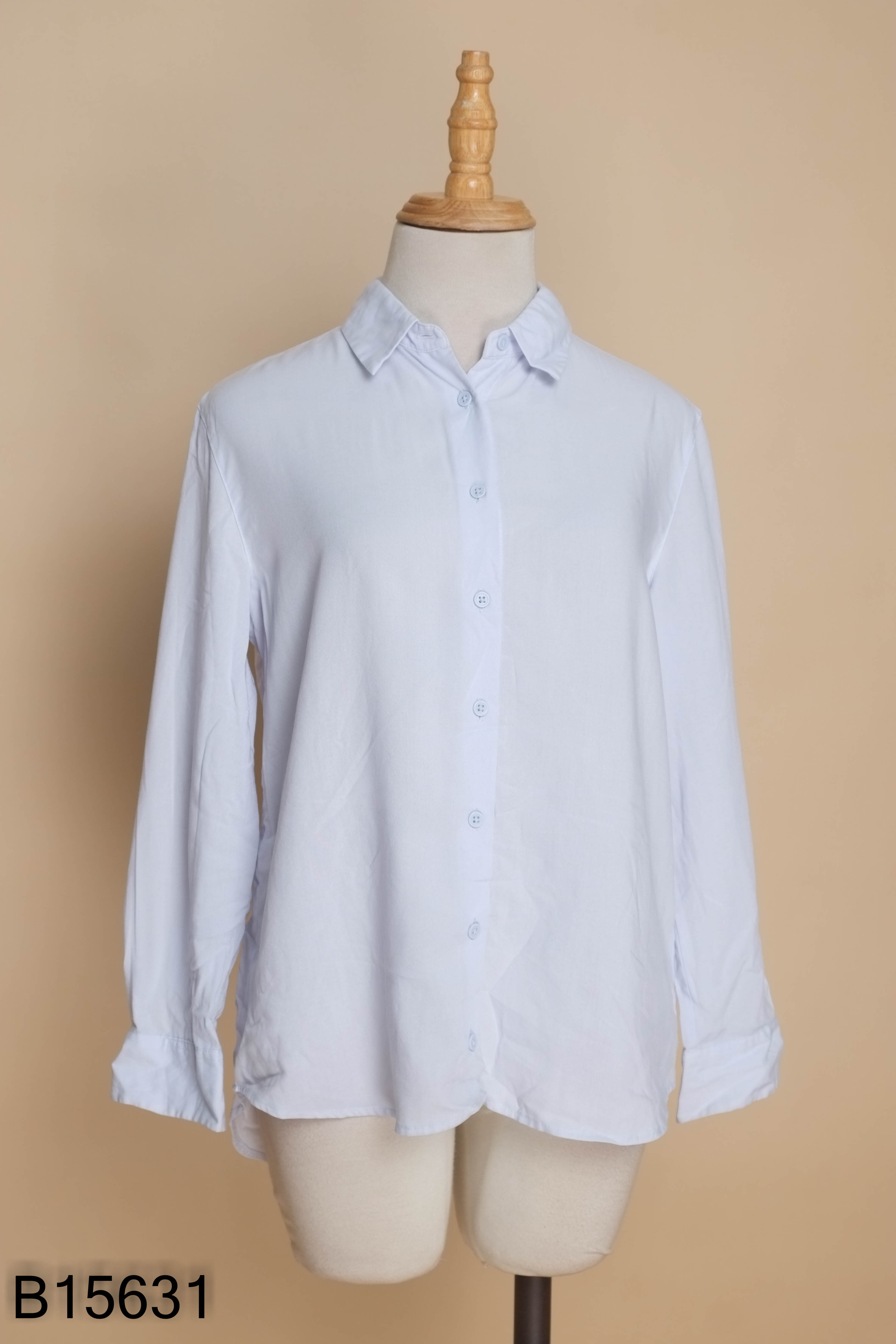 Áo sơ mi UNIQLO xanh trơn
