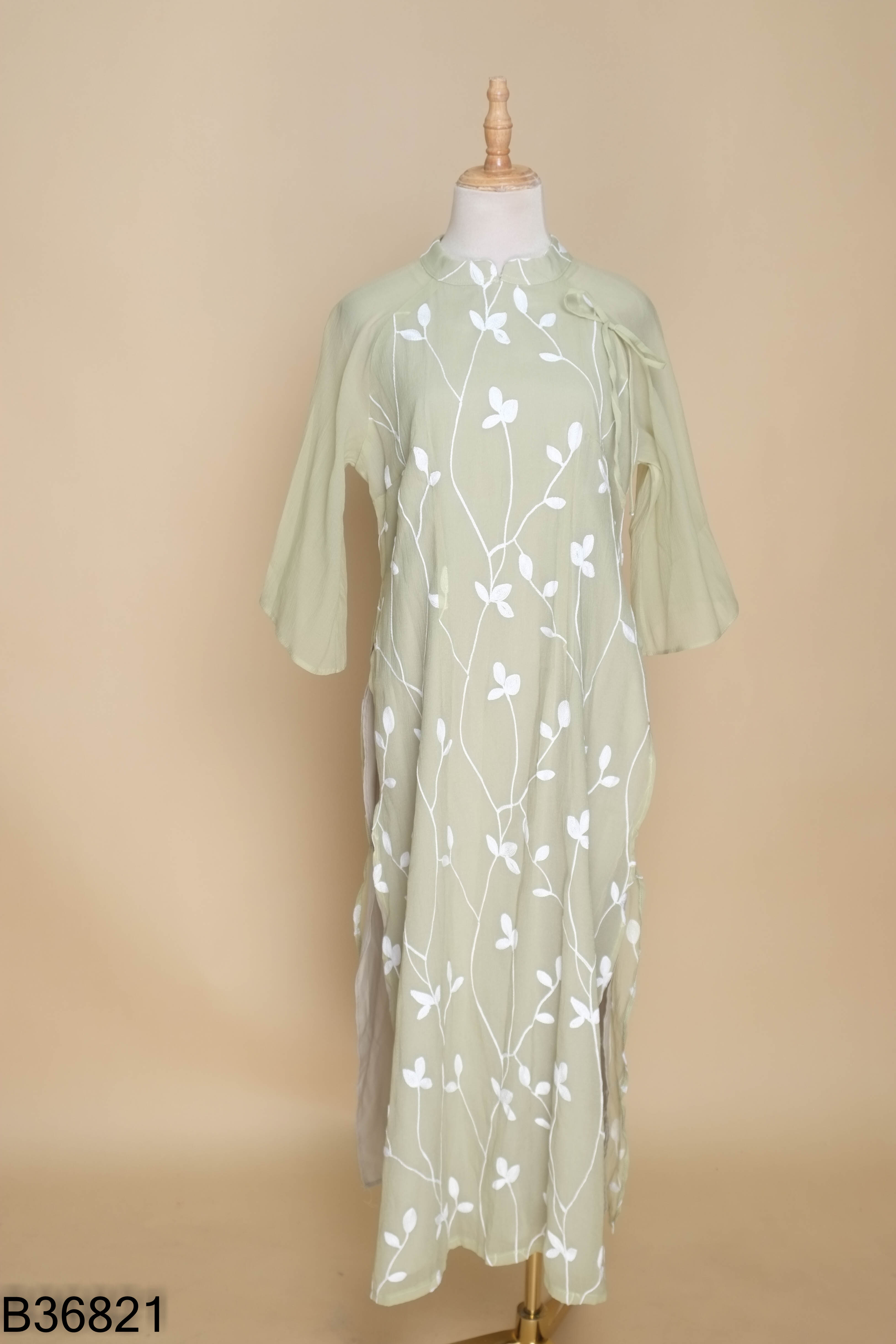 Áo dài xanh hoa trắng