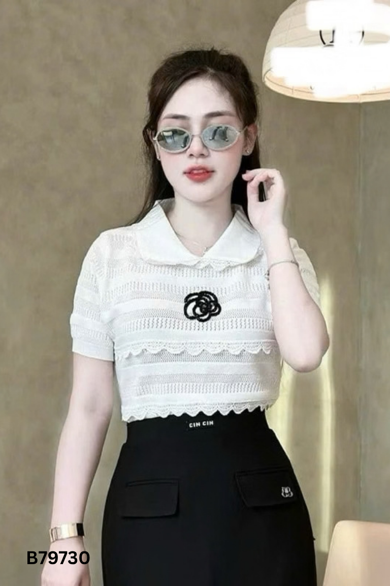 Áo len trắng ngà đính hoa