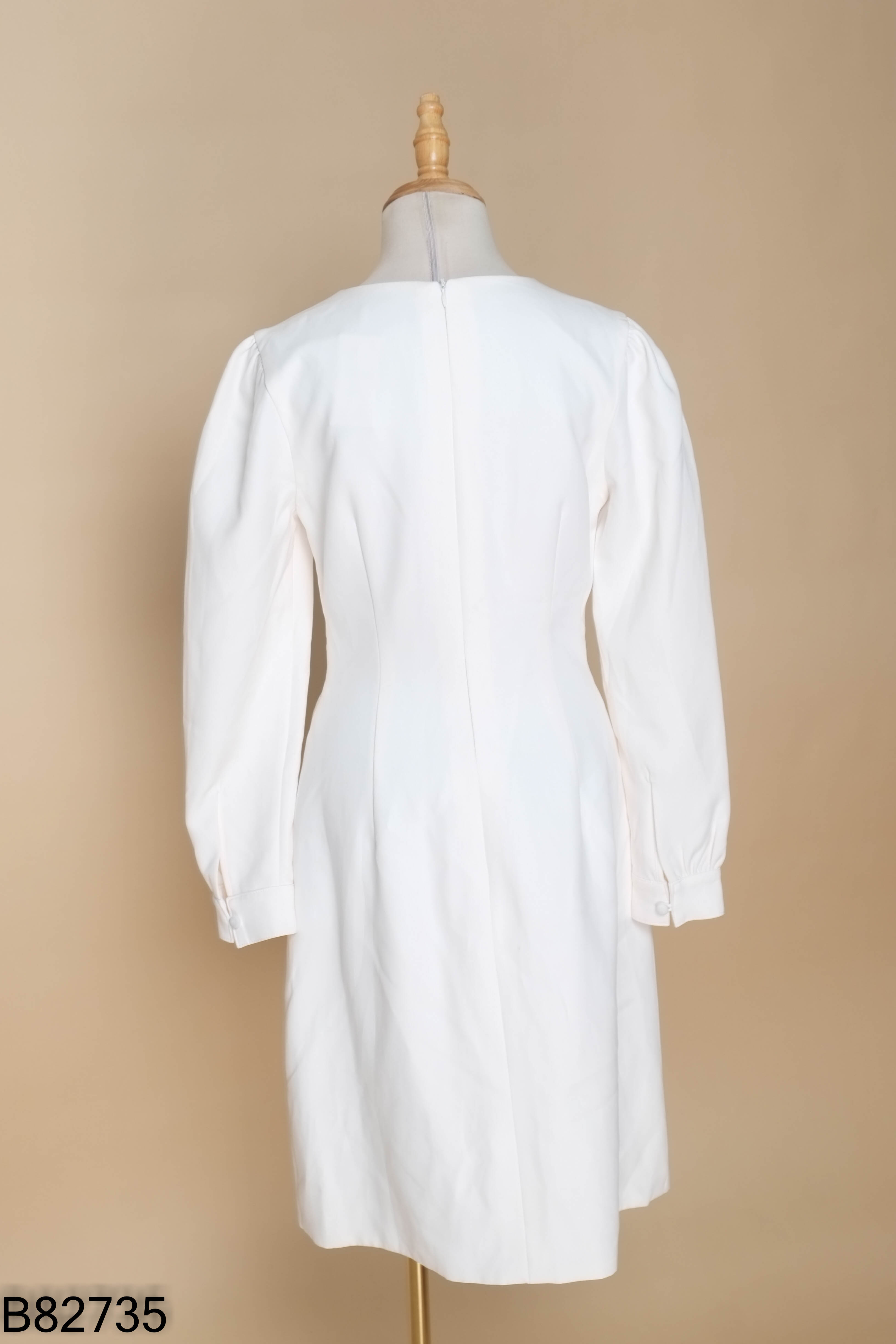 Váy trắng HA BOUTIQUE xoắn eo