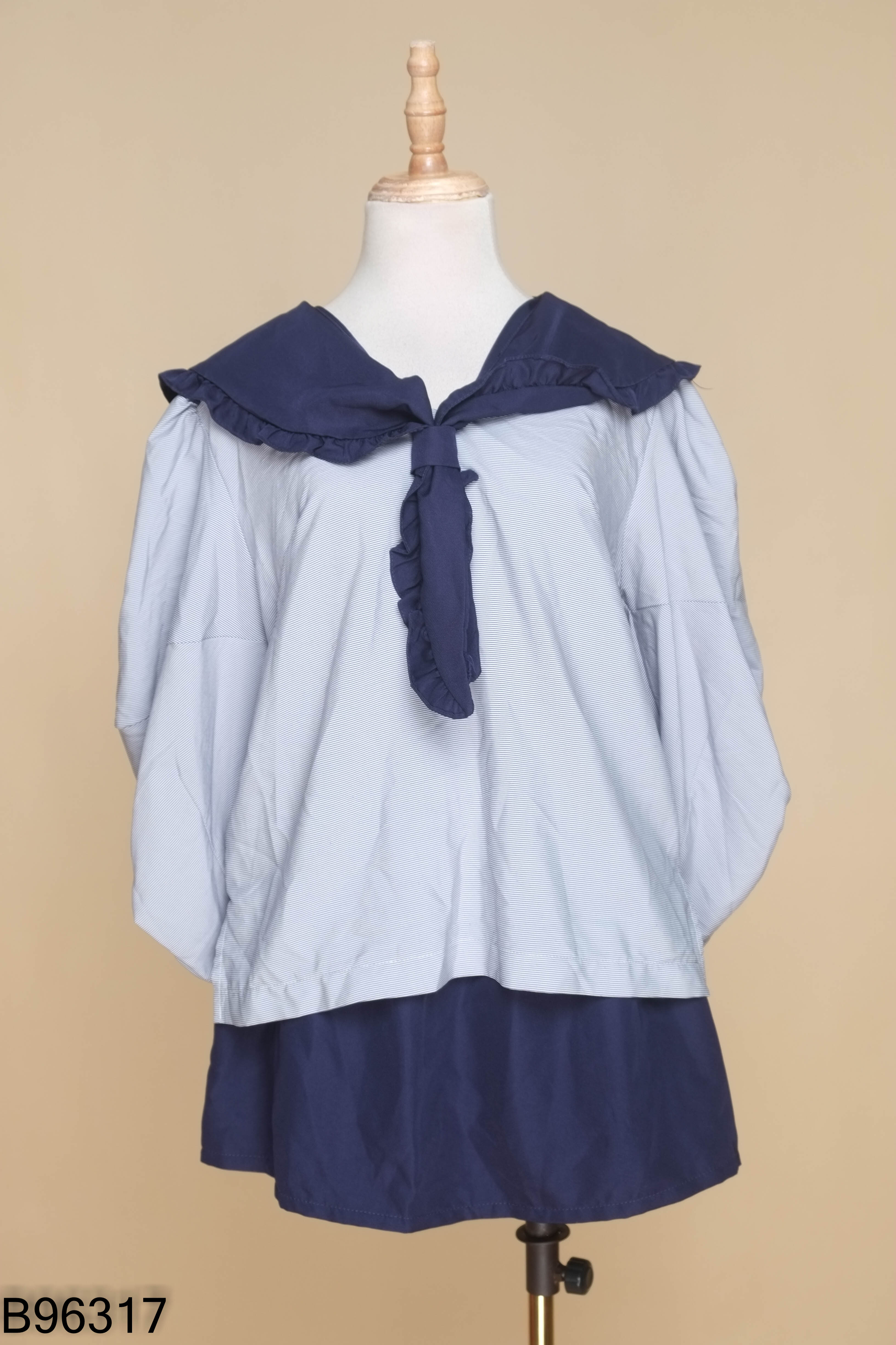 Set Áo babydoll xanh kẻ phối nơ + Chân váy