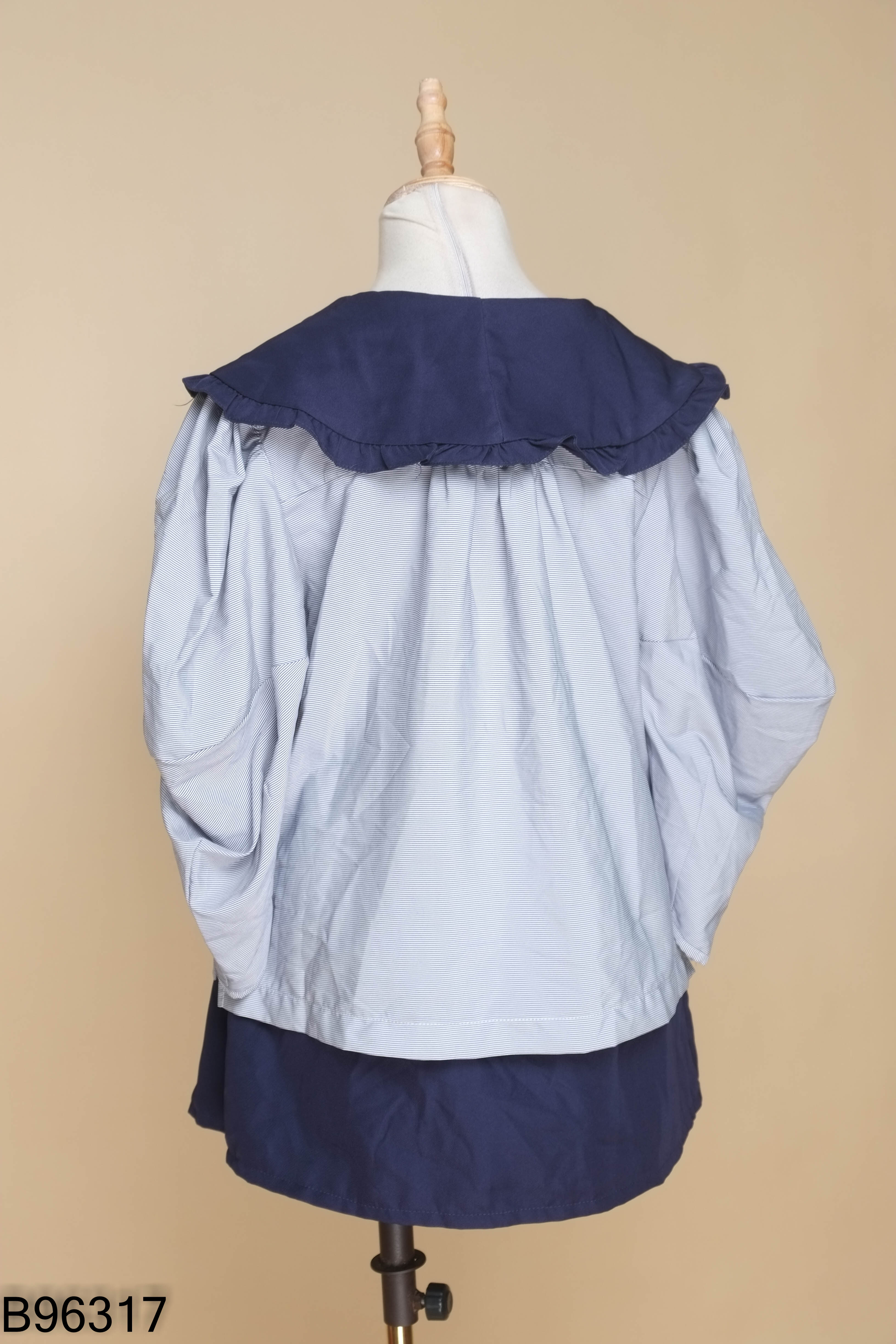 Set Áo babydoll xanh kẻ phối nơ + Chân váy