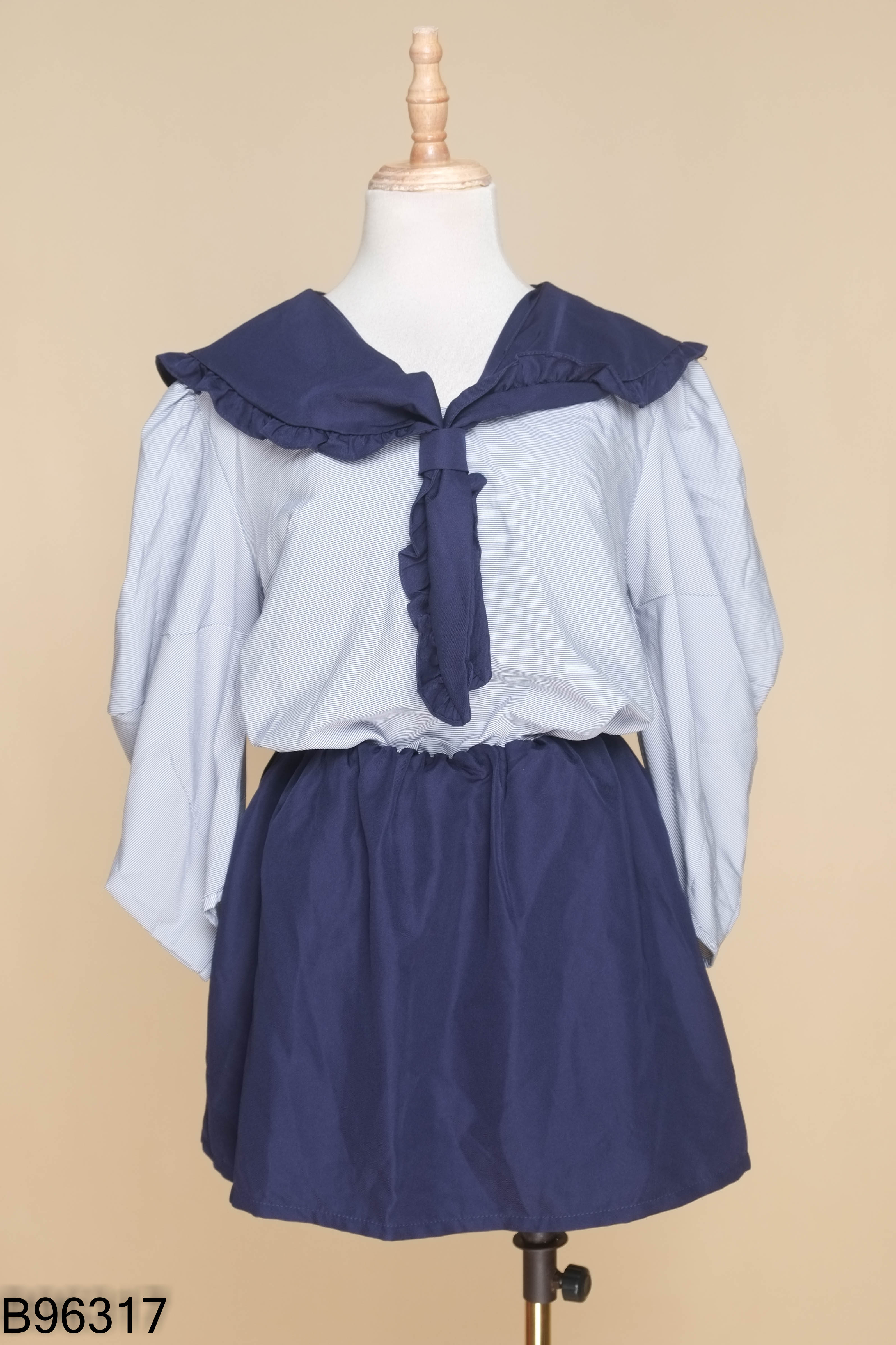 Set Áo babydoll xanh kẻ phối nơ + Chân váy