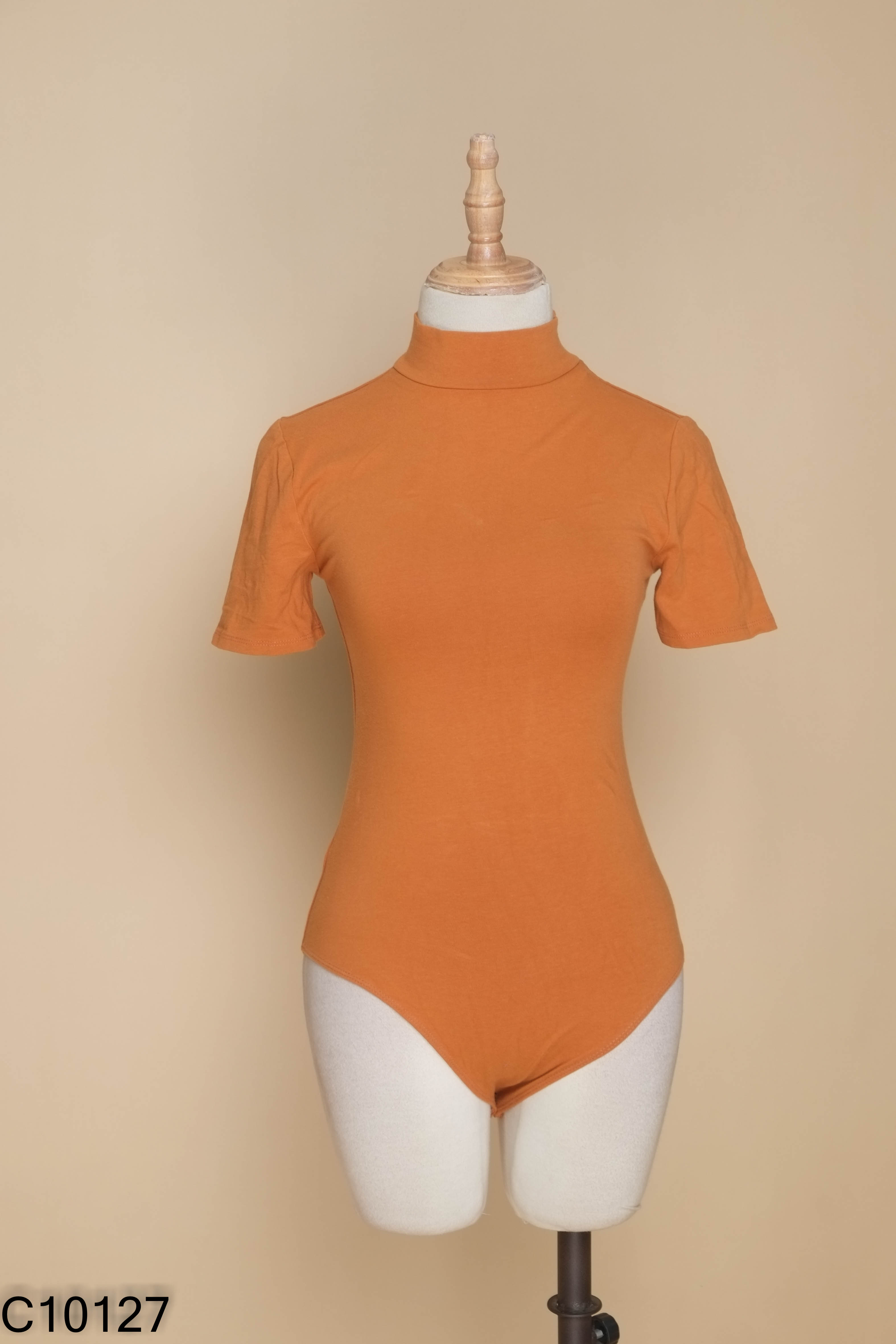 Bodysuits cam nhạt cổ cao
