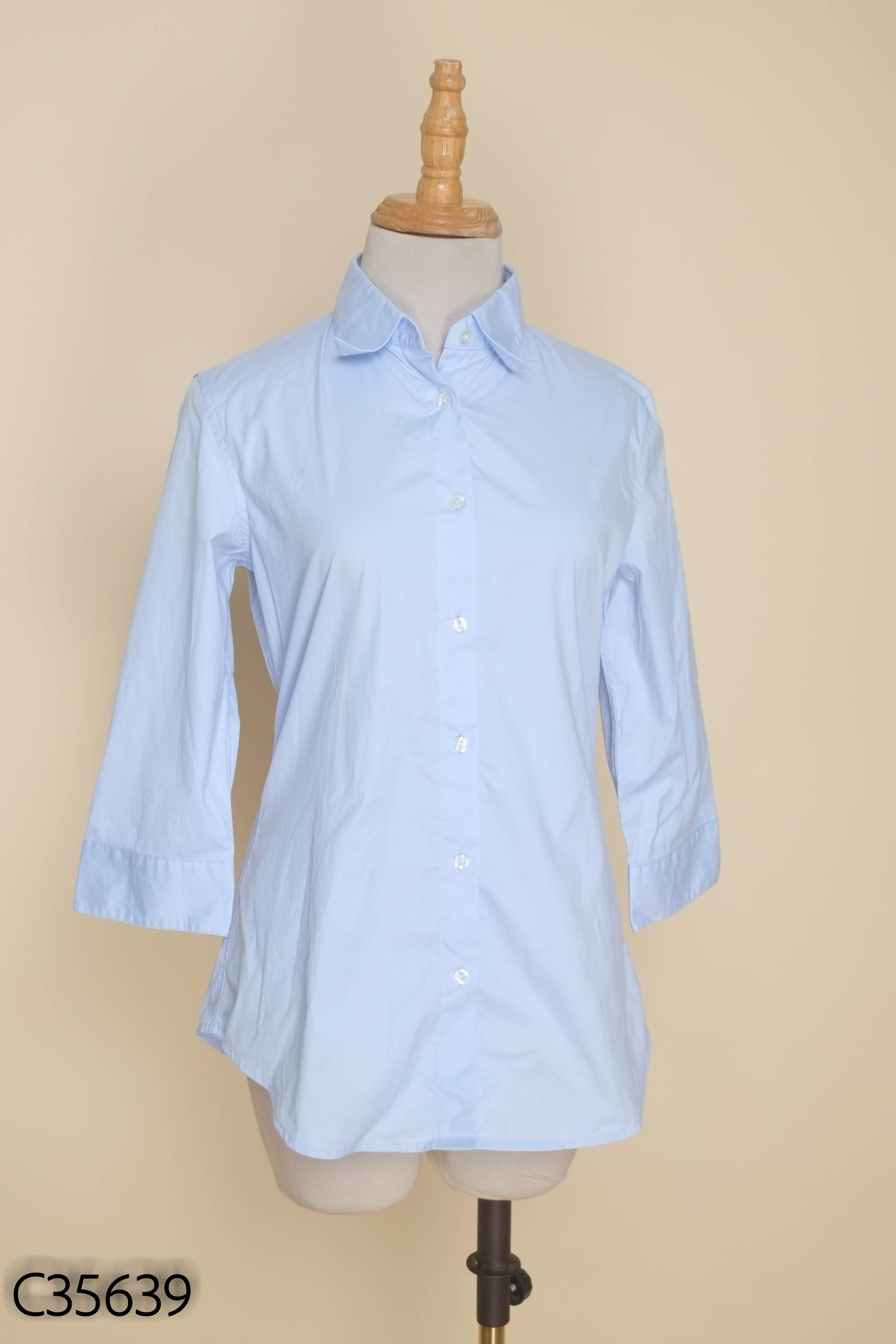 Áo sơ mi xanh UNIQLO