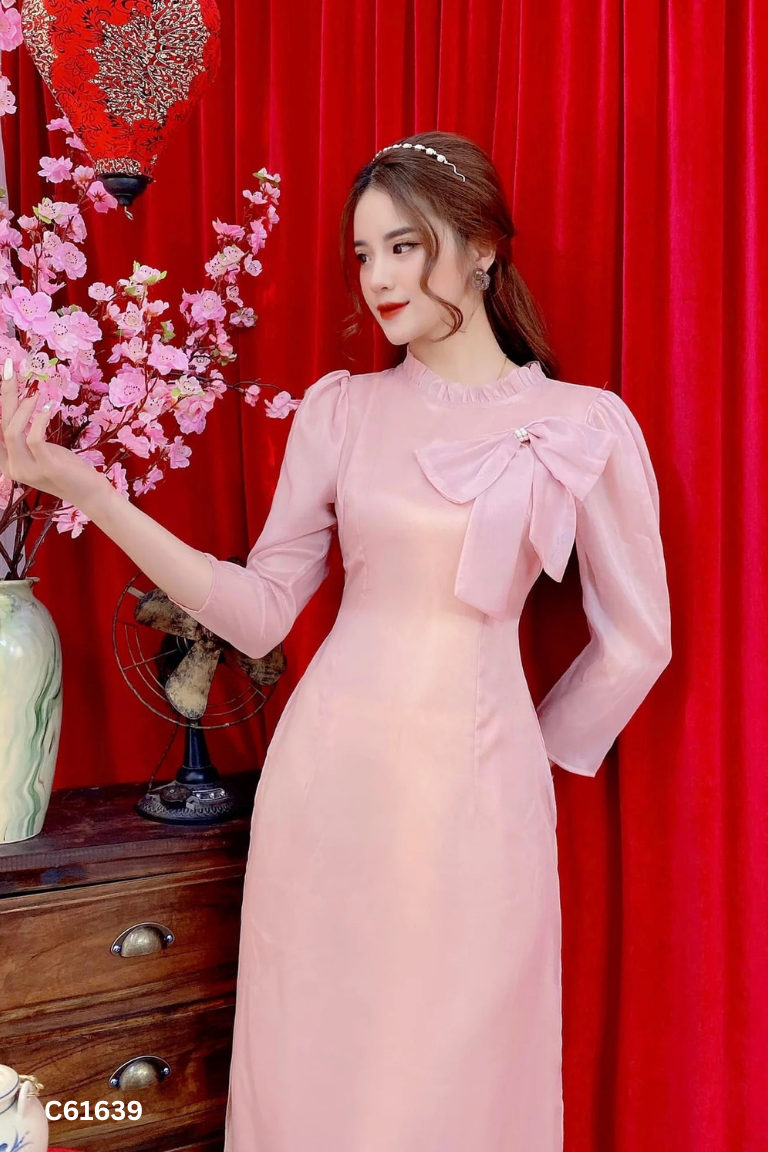 SET áo dài hồng đính nơ+ quần