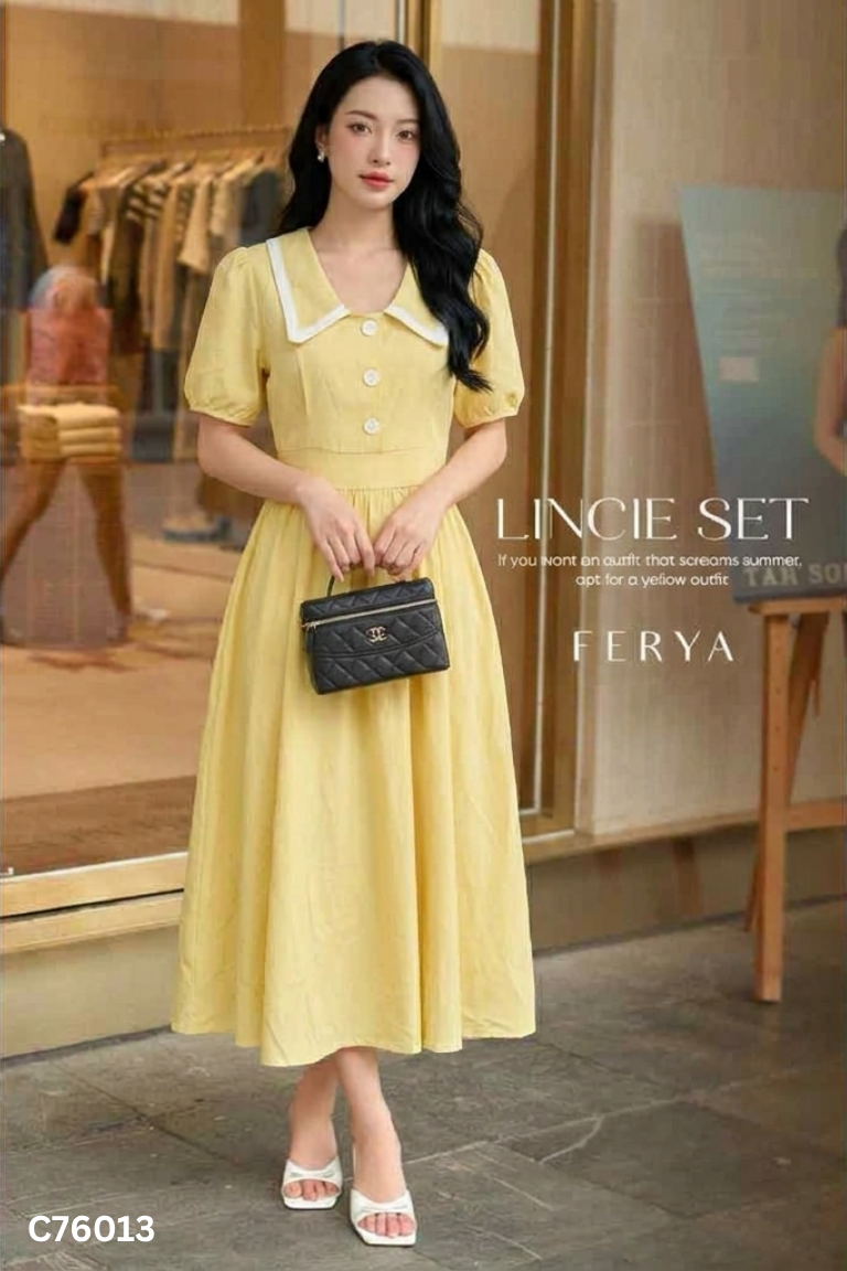 Váy vàng cổ sen phối cúc