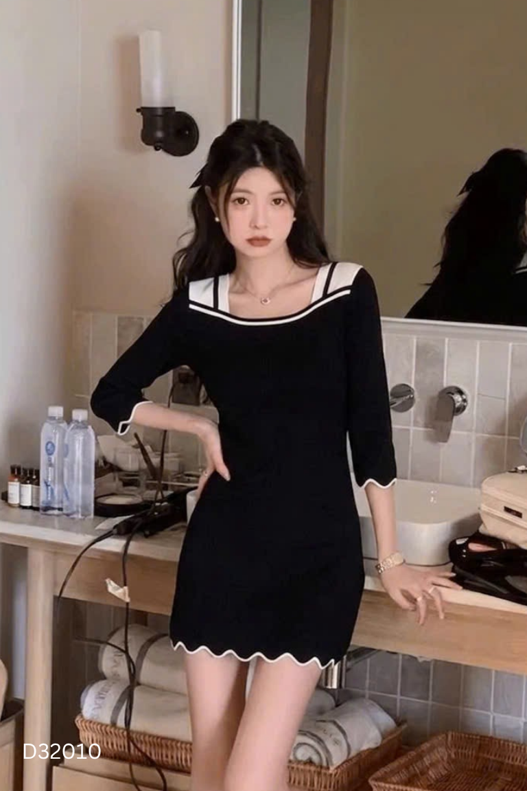 Váy len đen gân sọc viền trắng