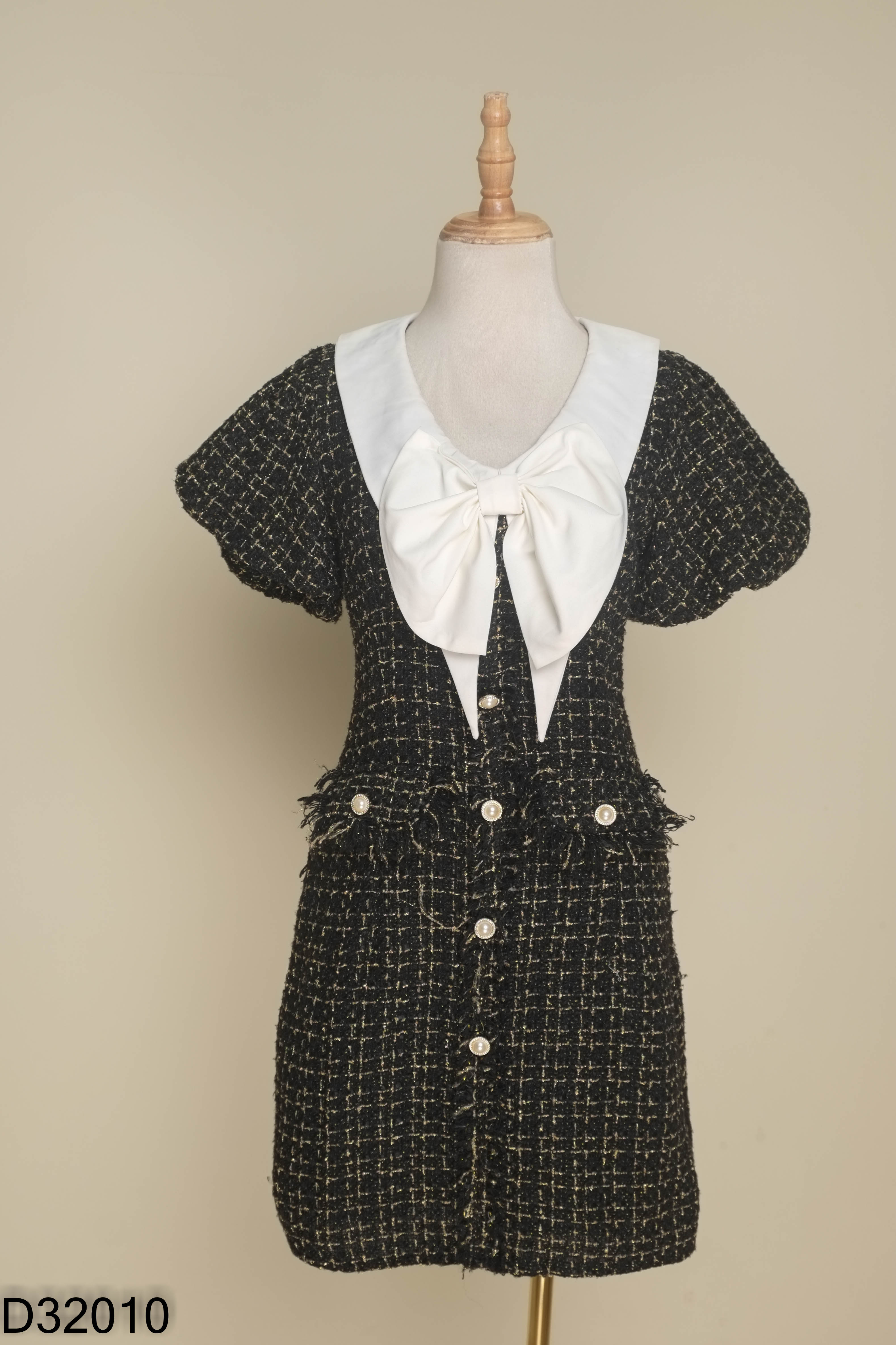 Váy dạ tweed len đen kẻ vàng phối nơ