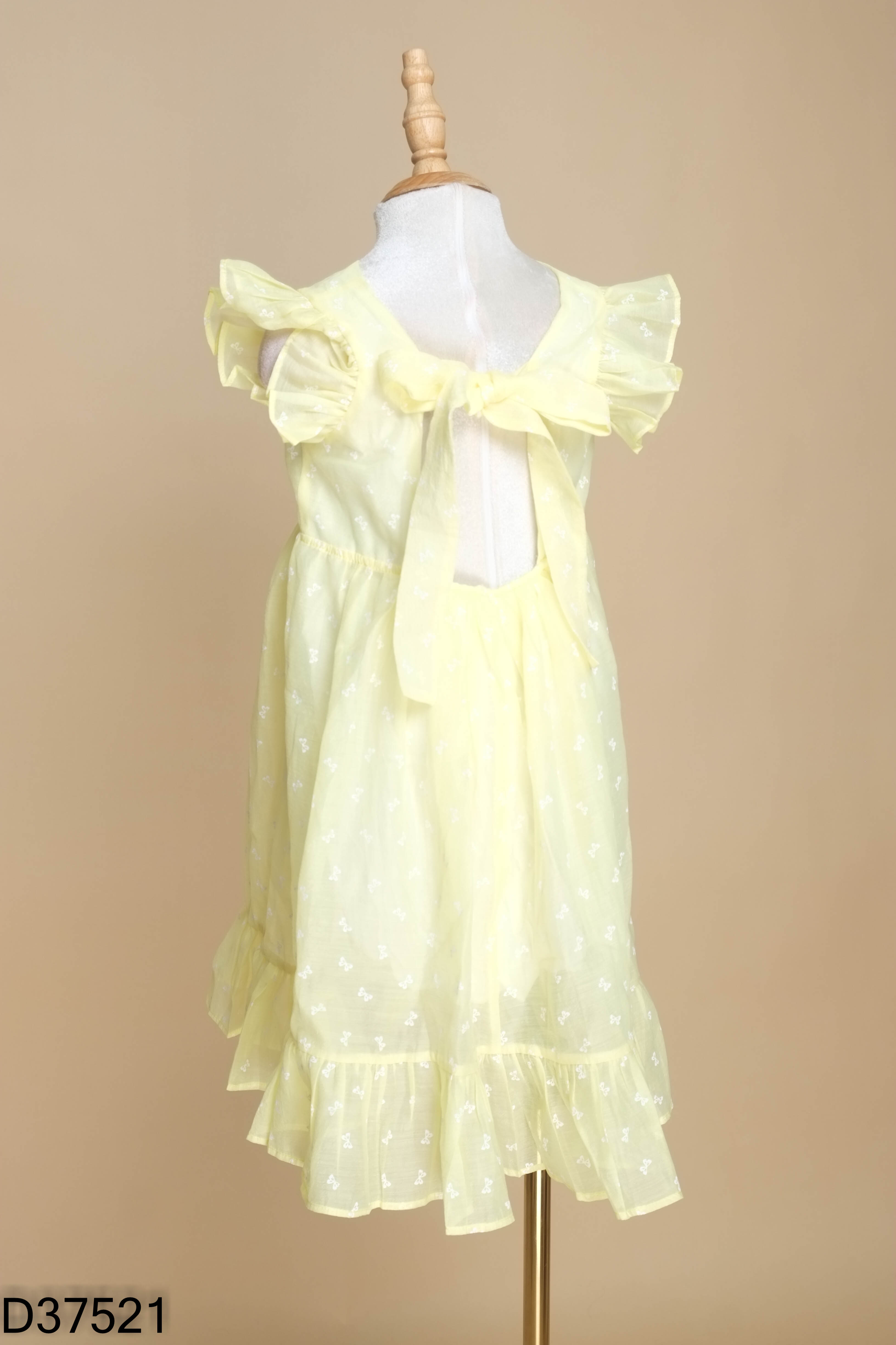 Váy babydoll vàng họa tiết nơ KIDS