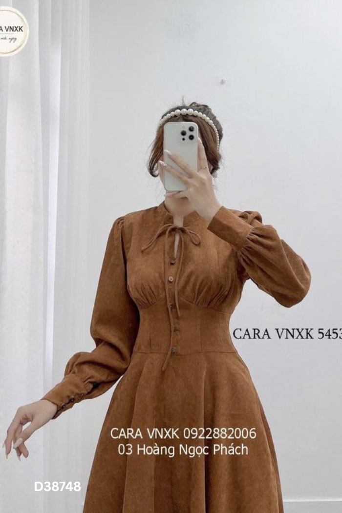 Váy nâu nhung tăm tay bồng