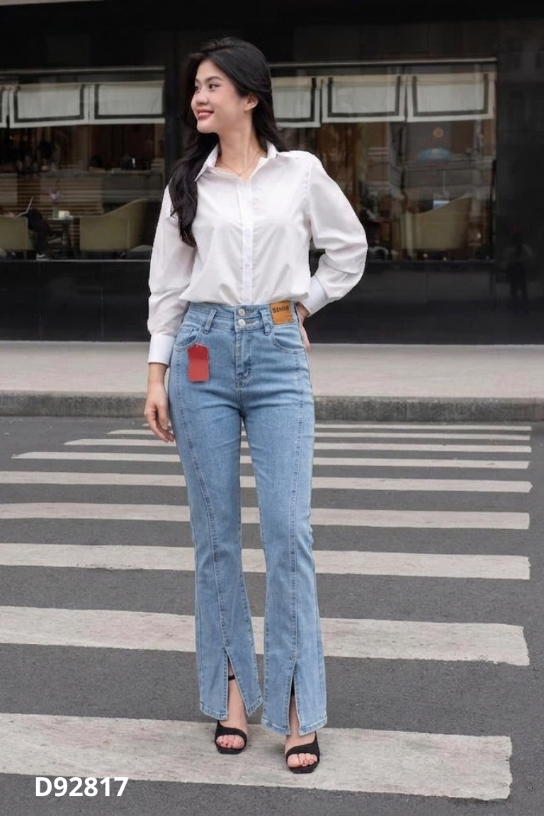 Quần jean xanh xẻ gấu