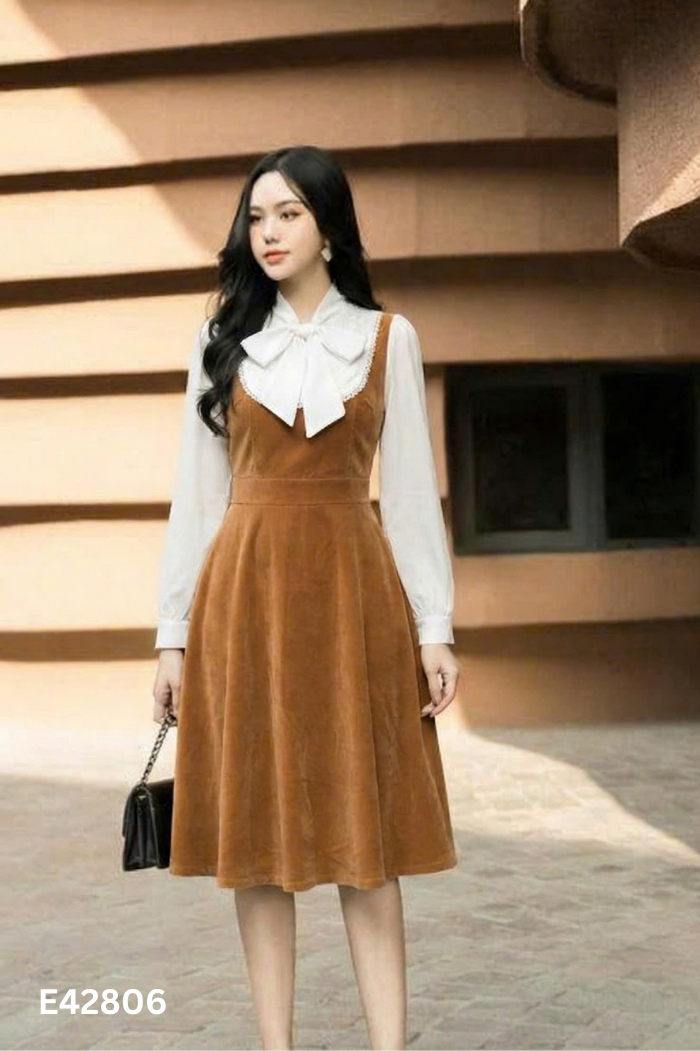 Váy nhung be phối tay voan trắng