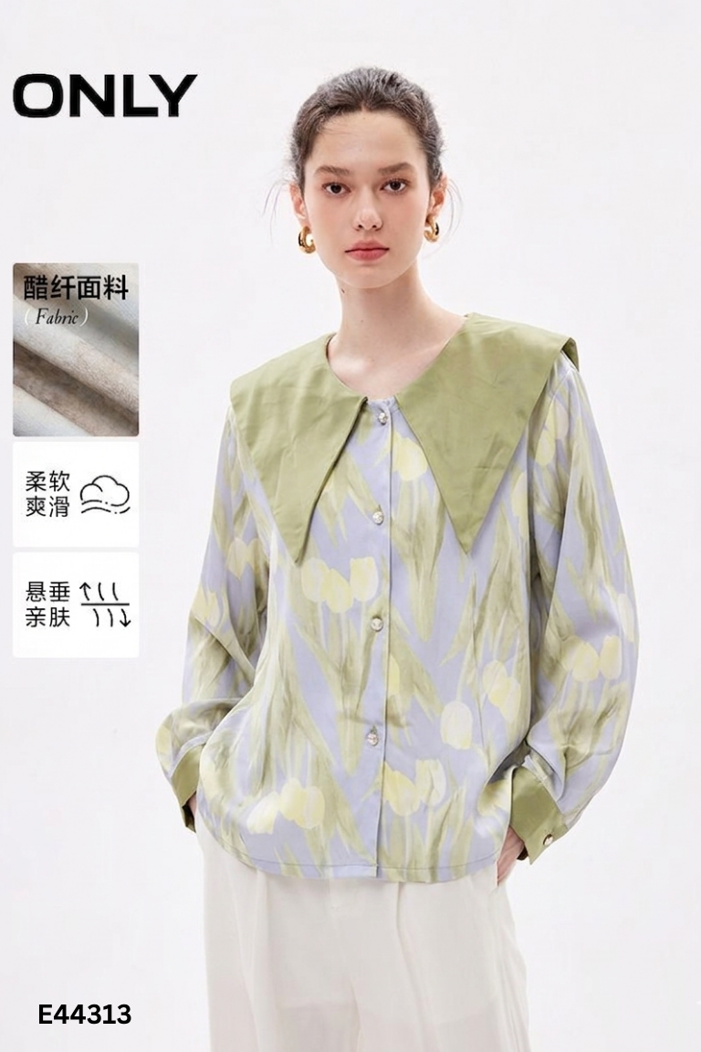 Áo sơ mi lụa xanh họa tiết