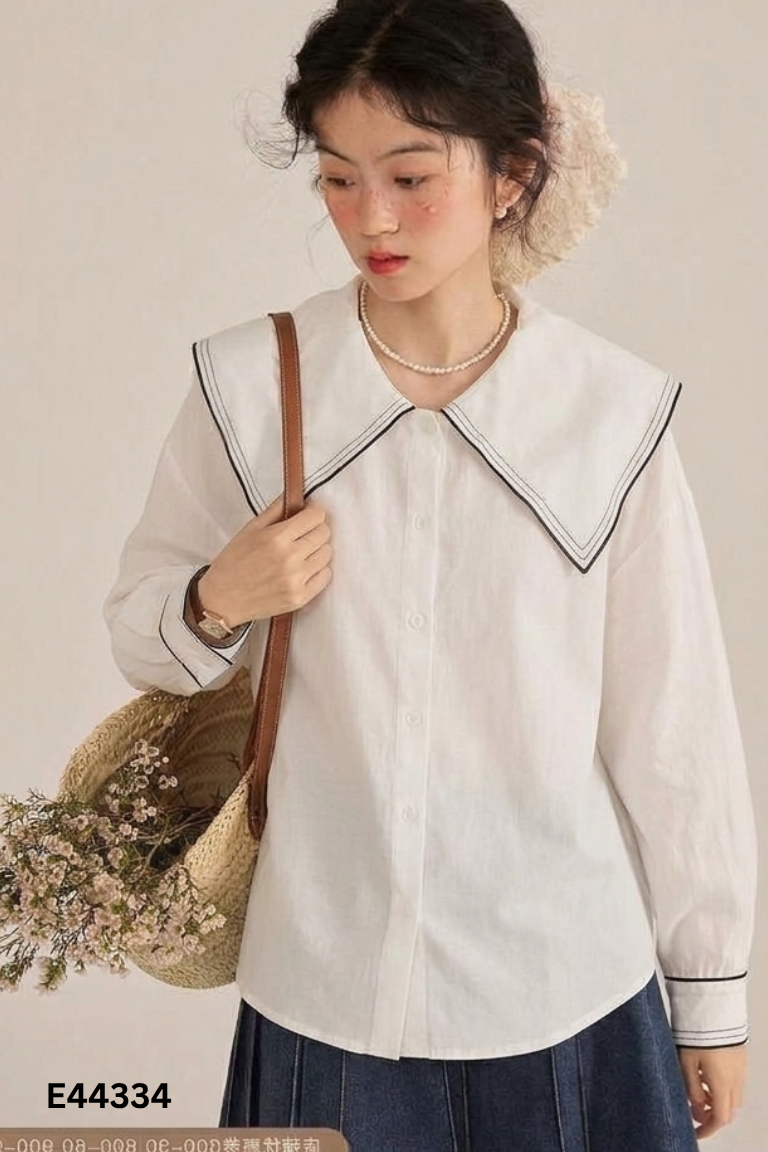 Áo sơ mi trắng phối cổ viền đen