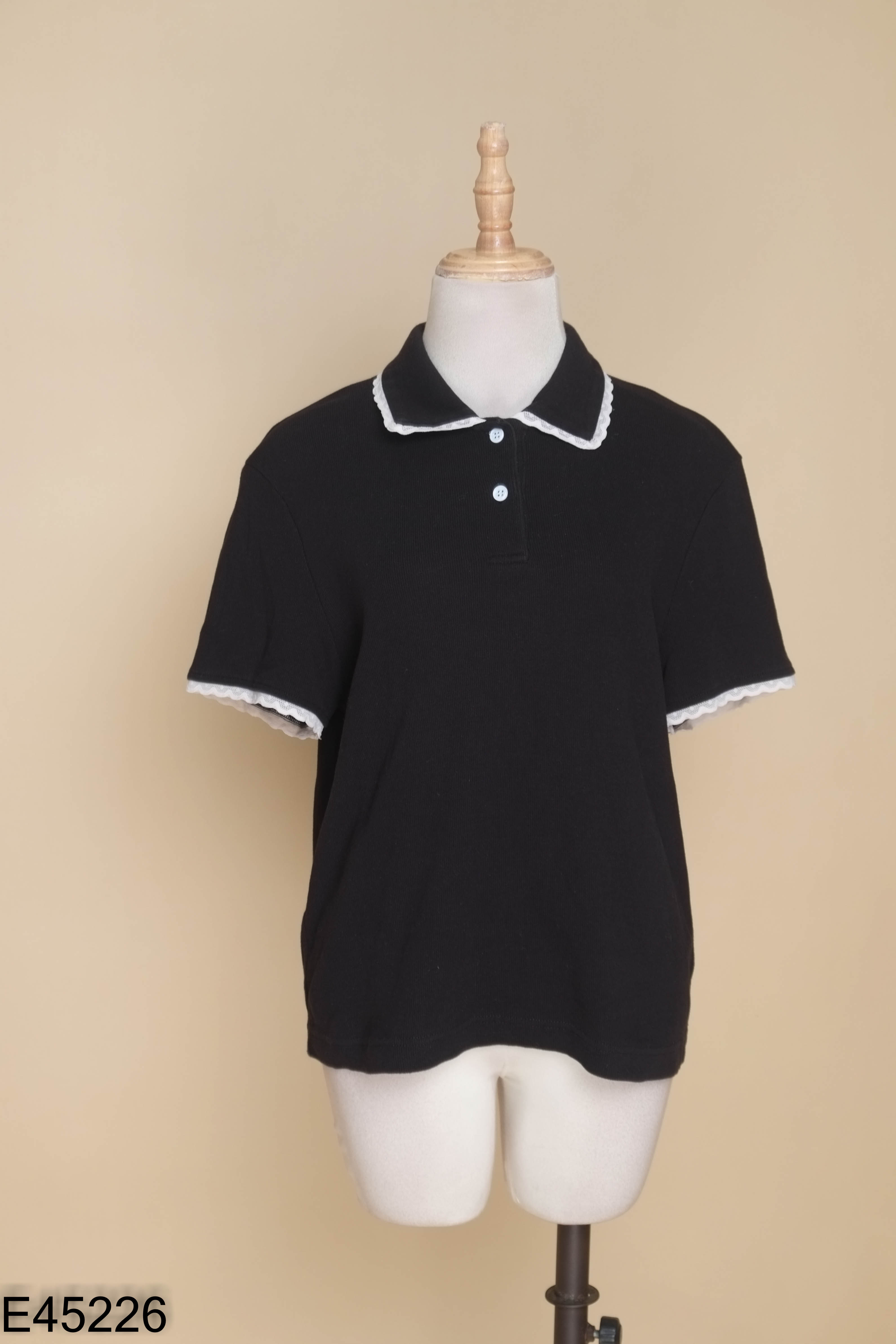 Áo polo đen viền be