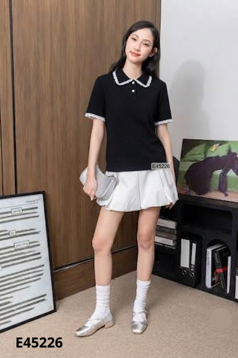 Áo polo đen viền be