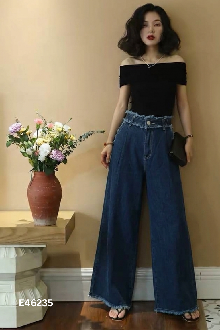Quần jeans xanh tua rua