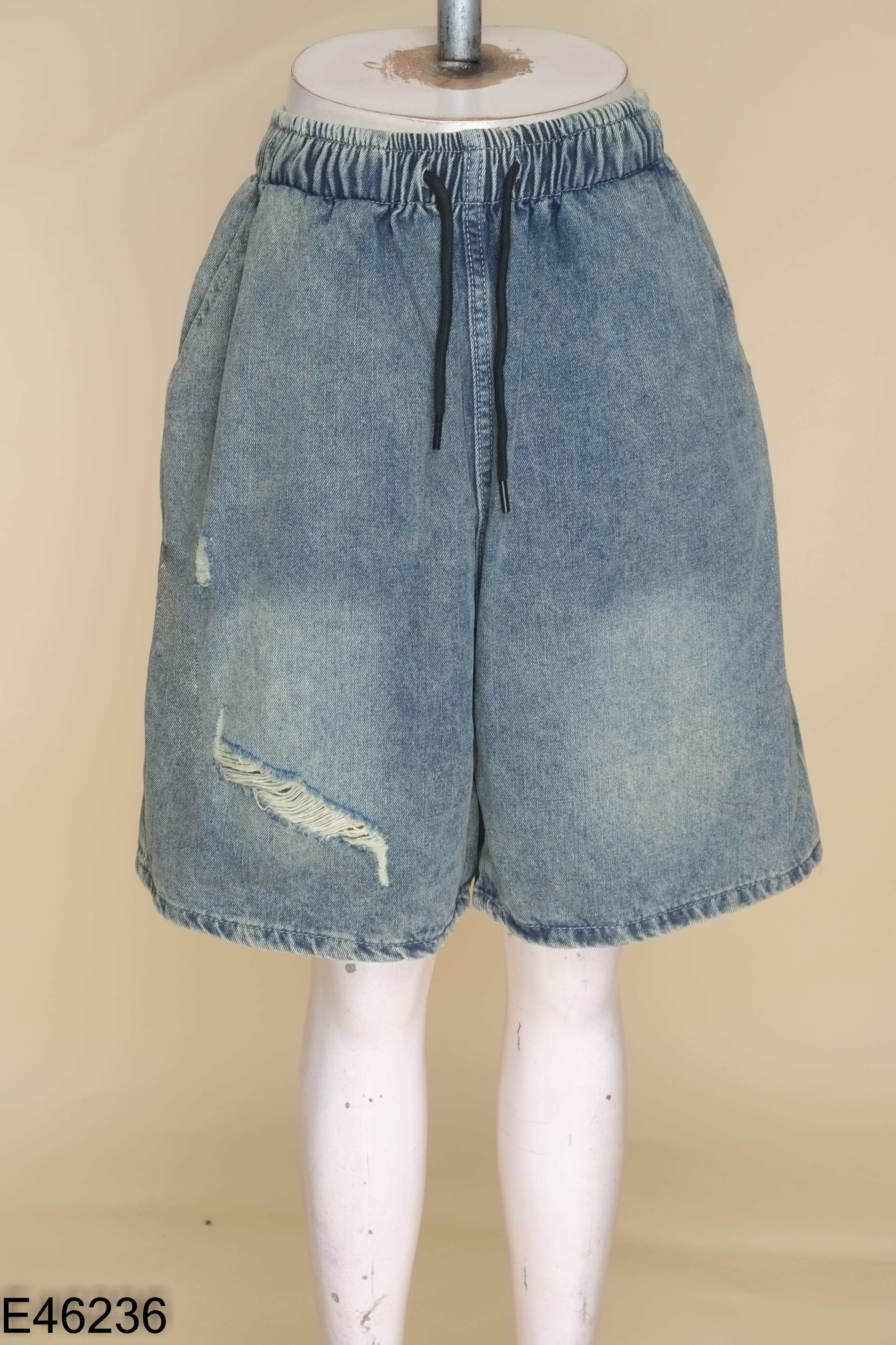 Quần jeans xanh rêu lửng cào gối
