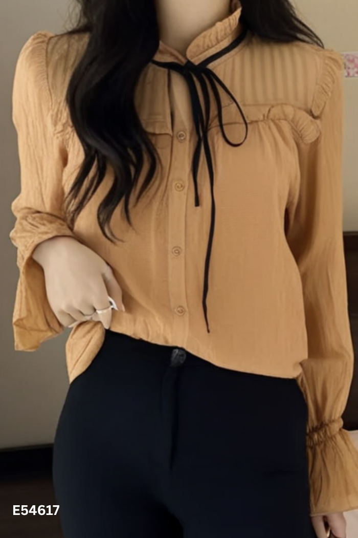 Áo tơ nâu buộc nơ đen