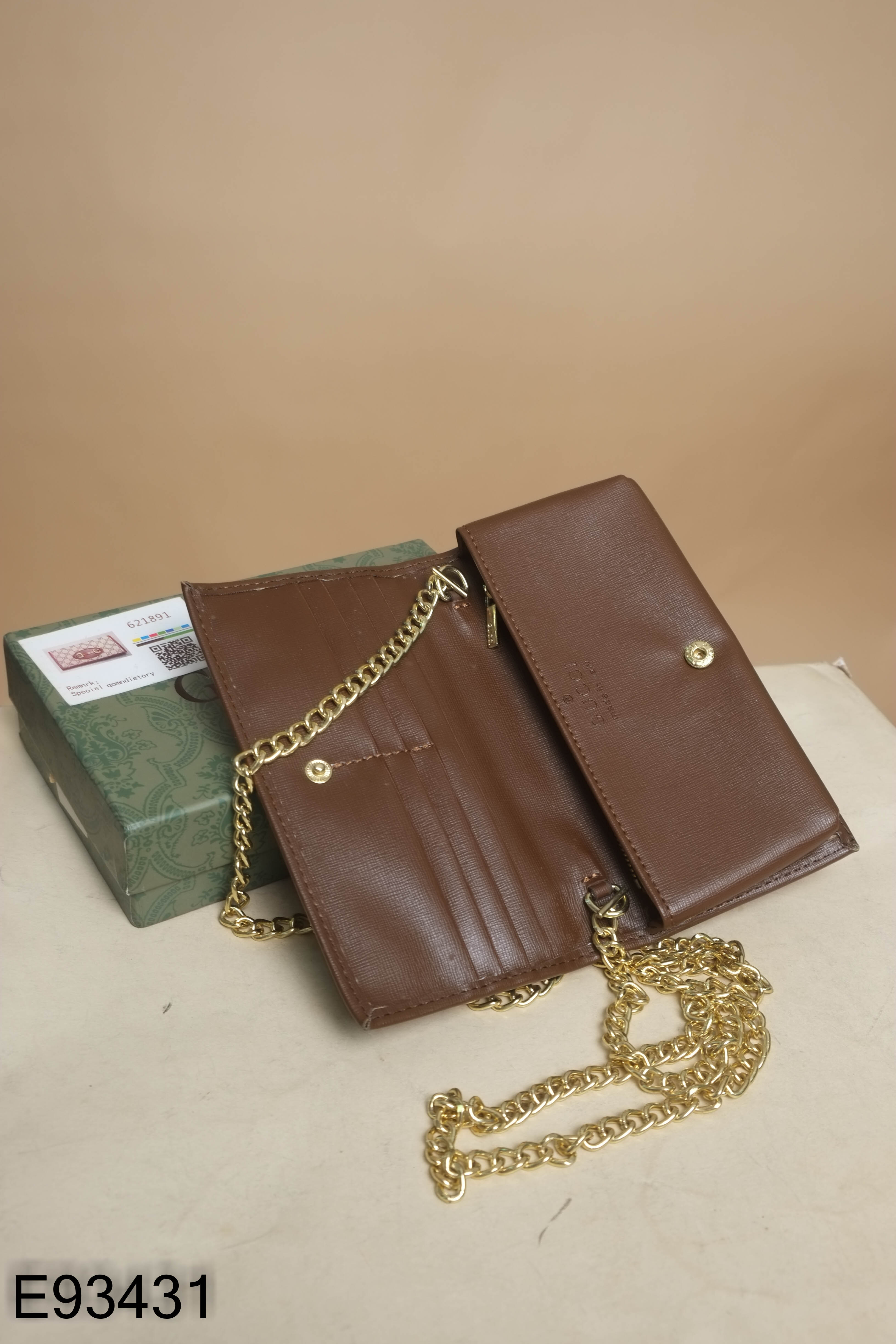 Ví cầm tay nâu họa tiết GUCCI