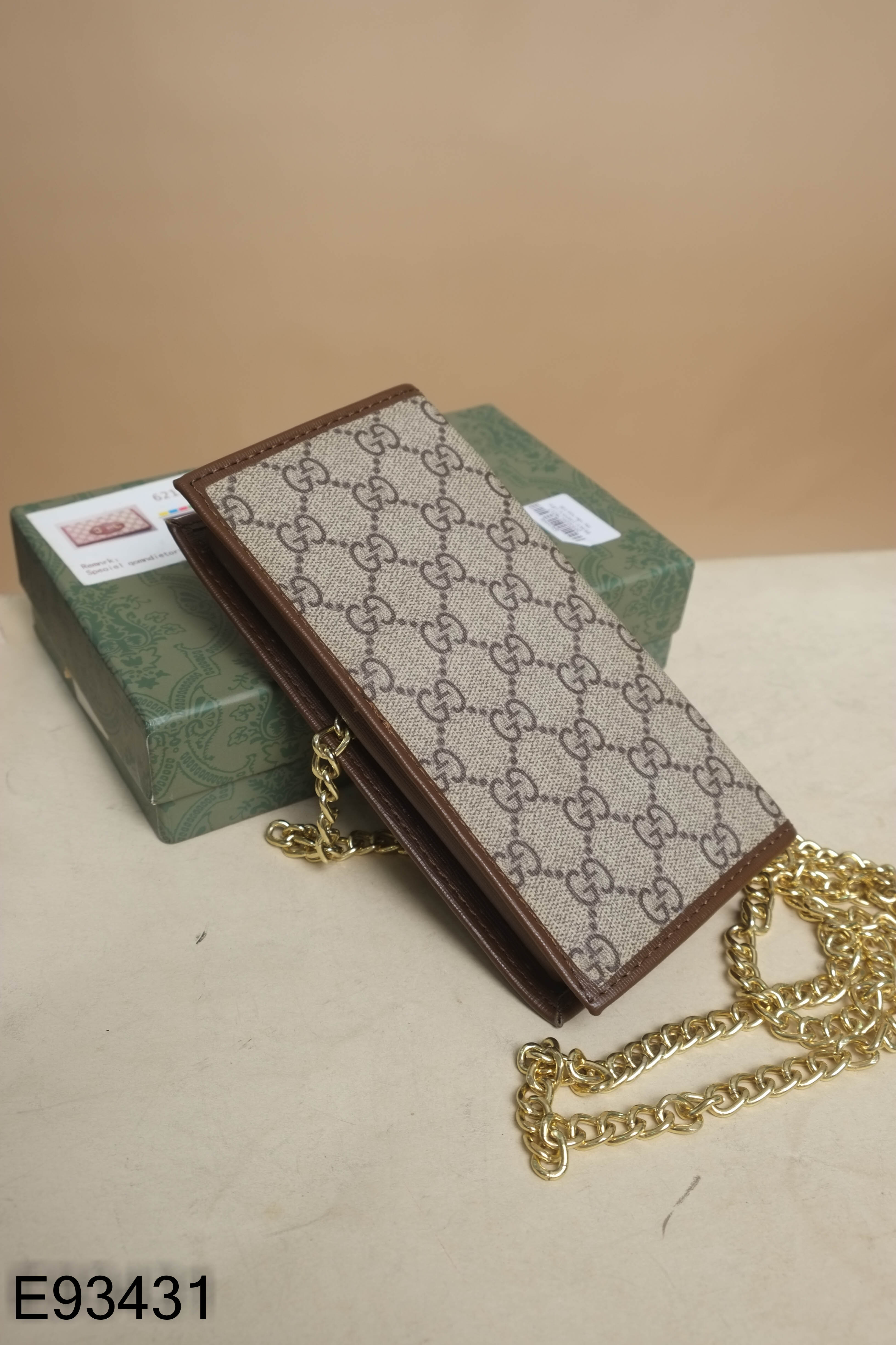 Ví cầm tay nâu họa tiết GUCCI