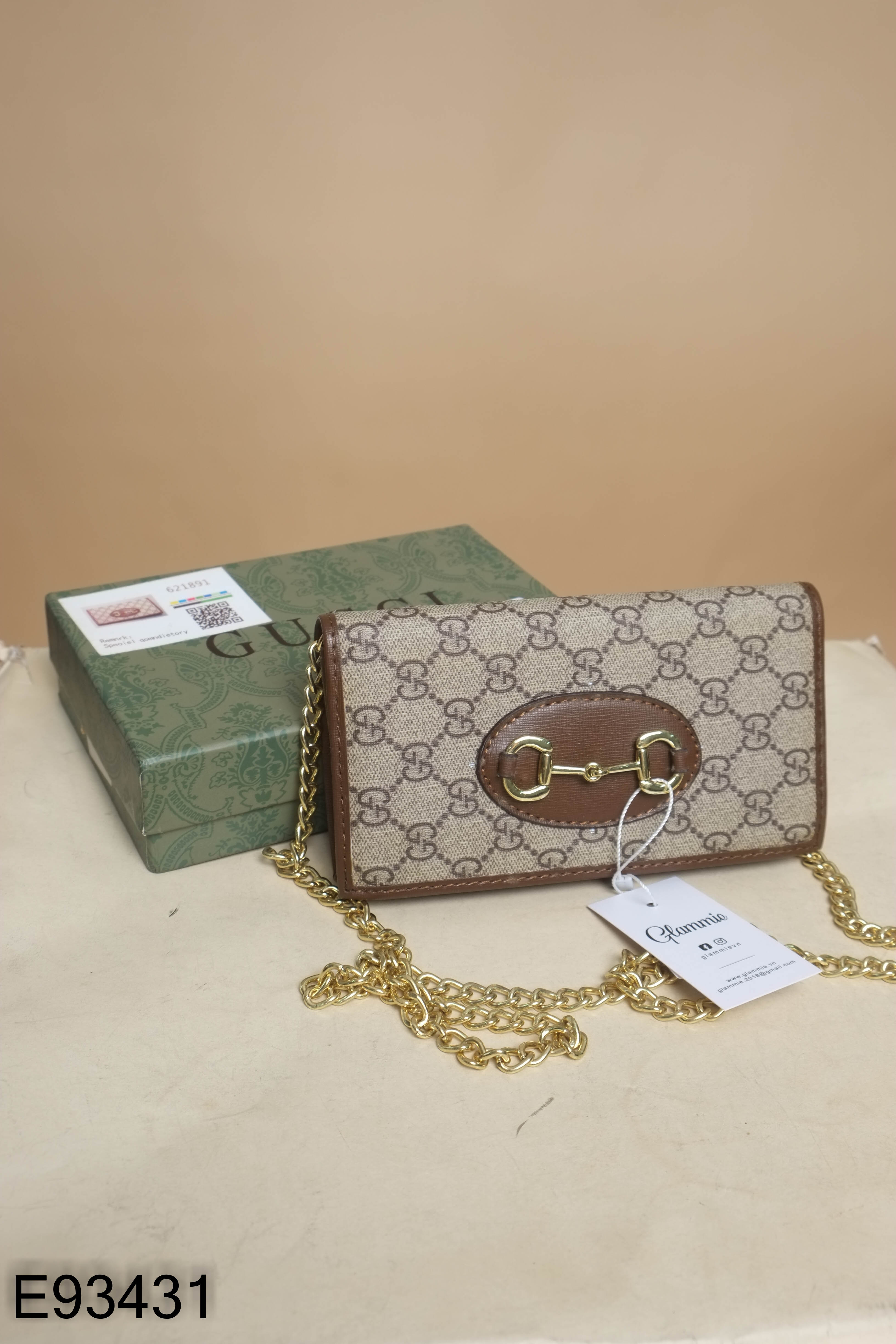 Ví cầm tay nâu họa tiết GUCCI