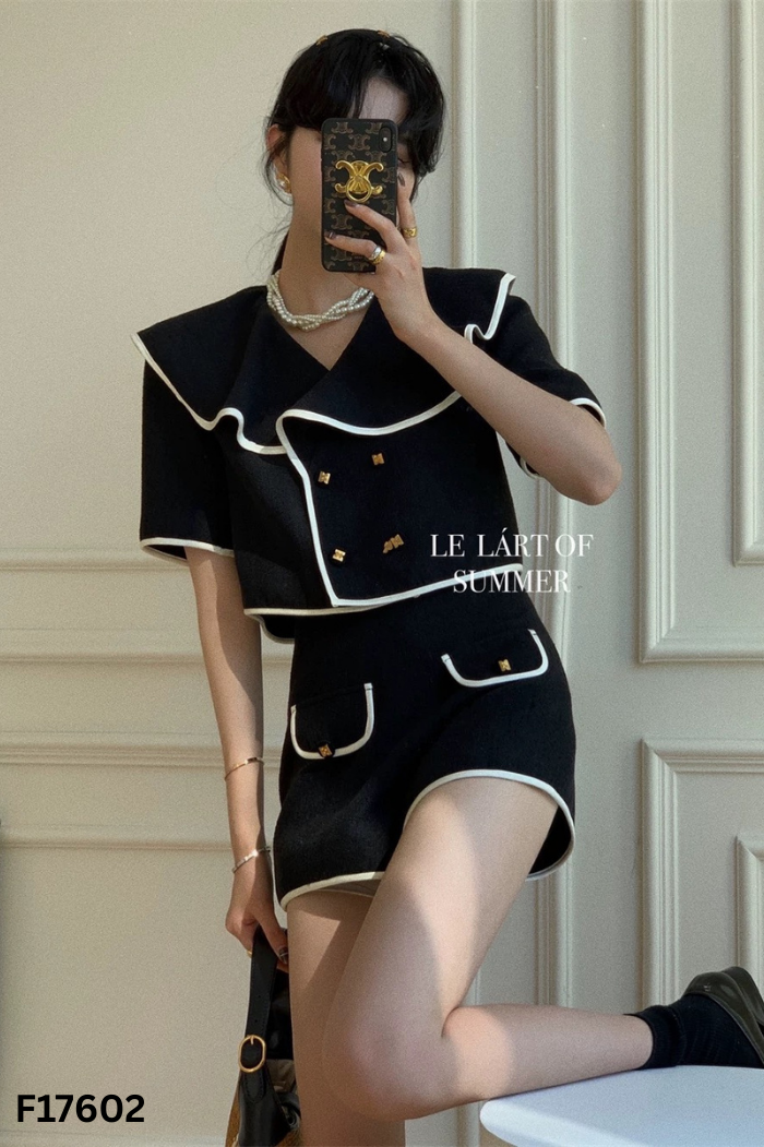 Áo đen cổ sen viền trắng