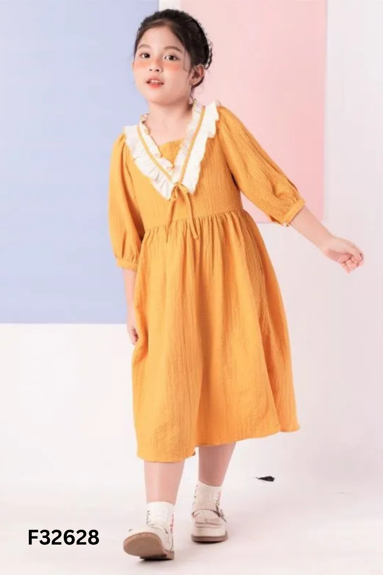 Váy đũi vàng viền bèo trắng