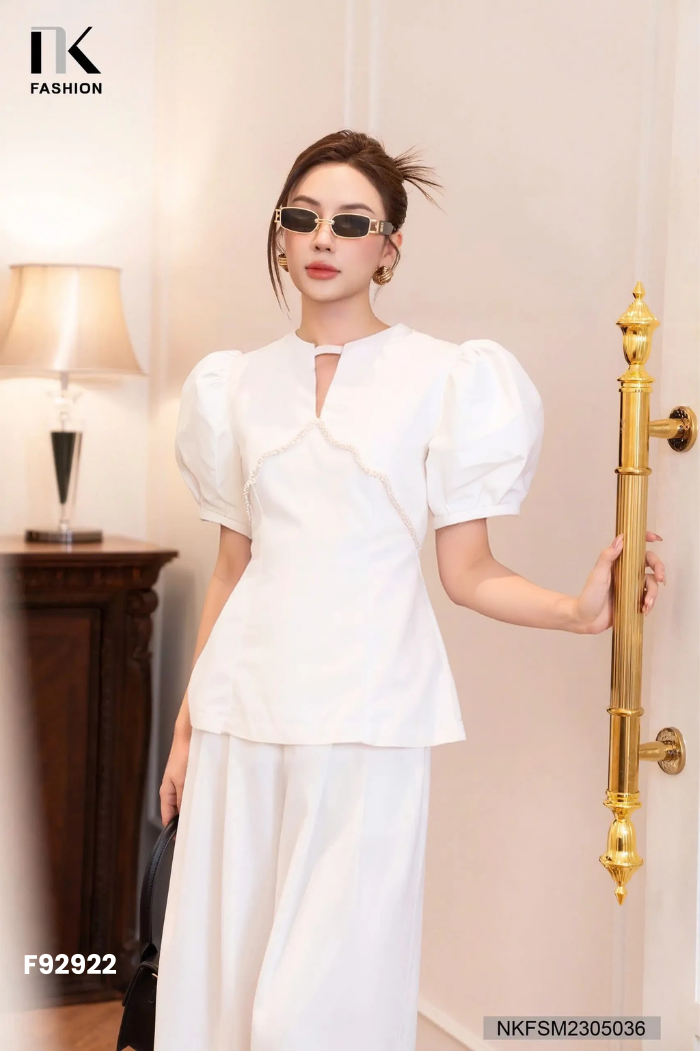 Áo POPO trắng viền ngọc