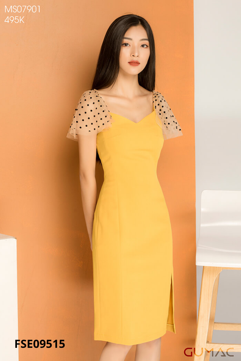 Váy vàng phối nâu chấm bi