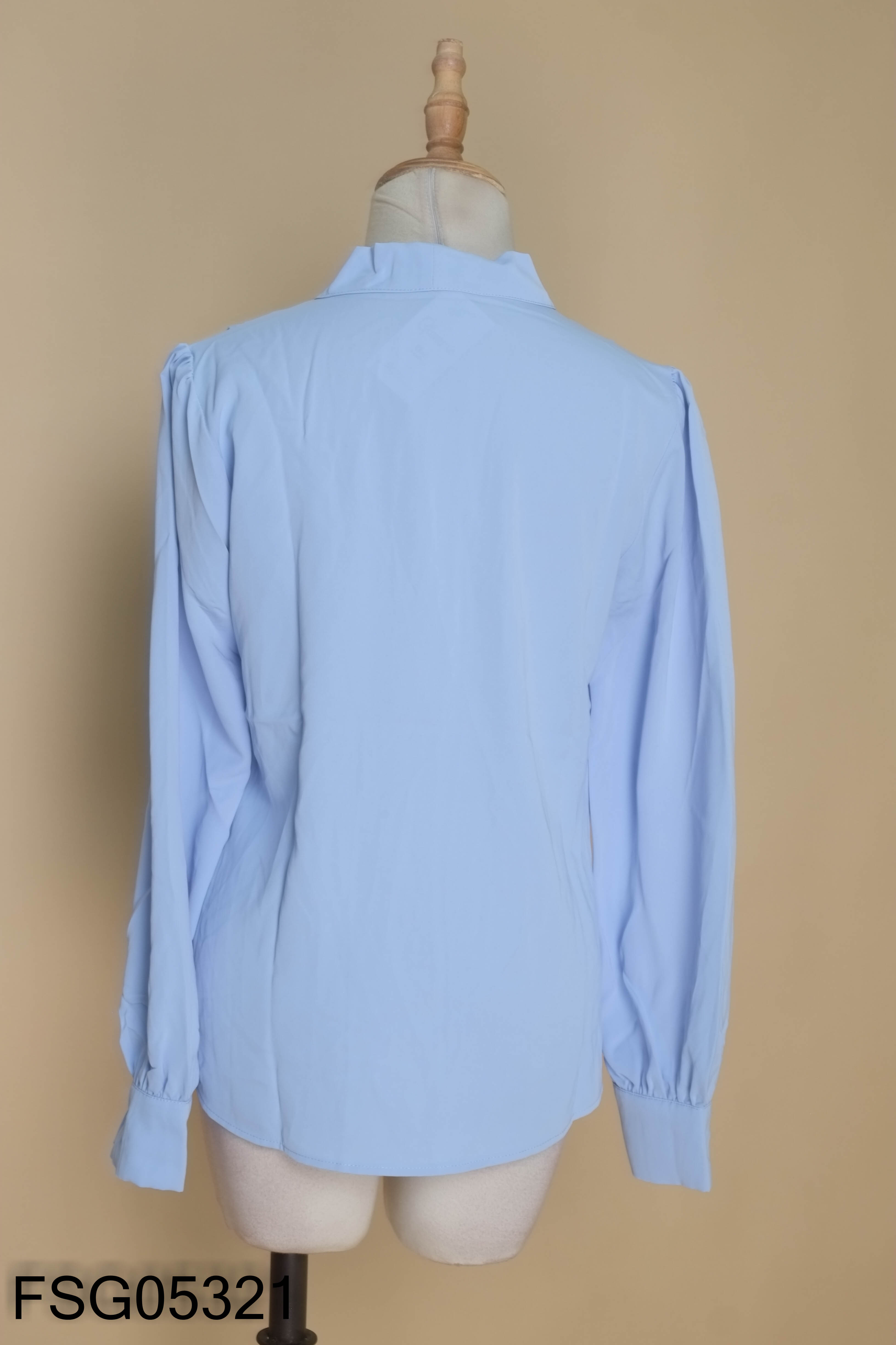 Áo xanh pastel nơ cổ