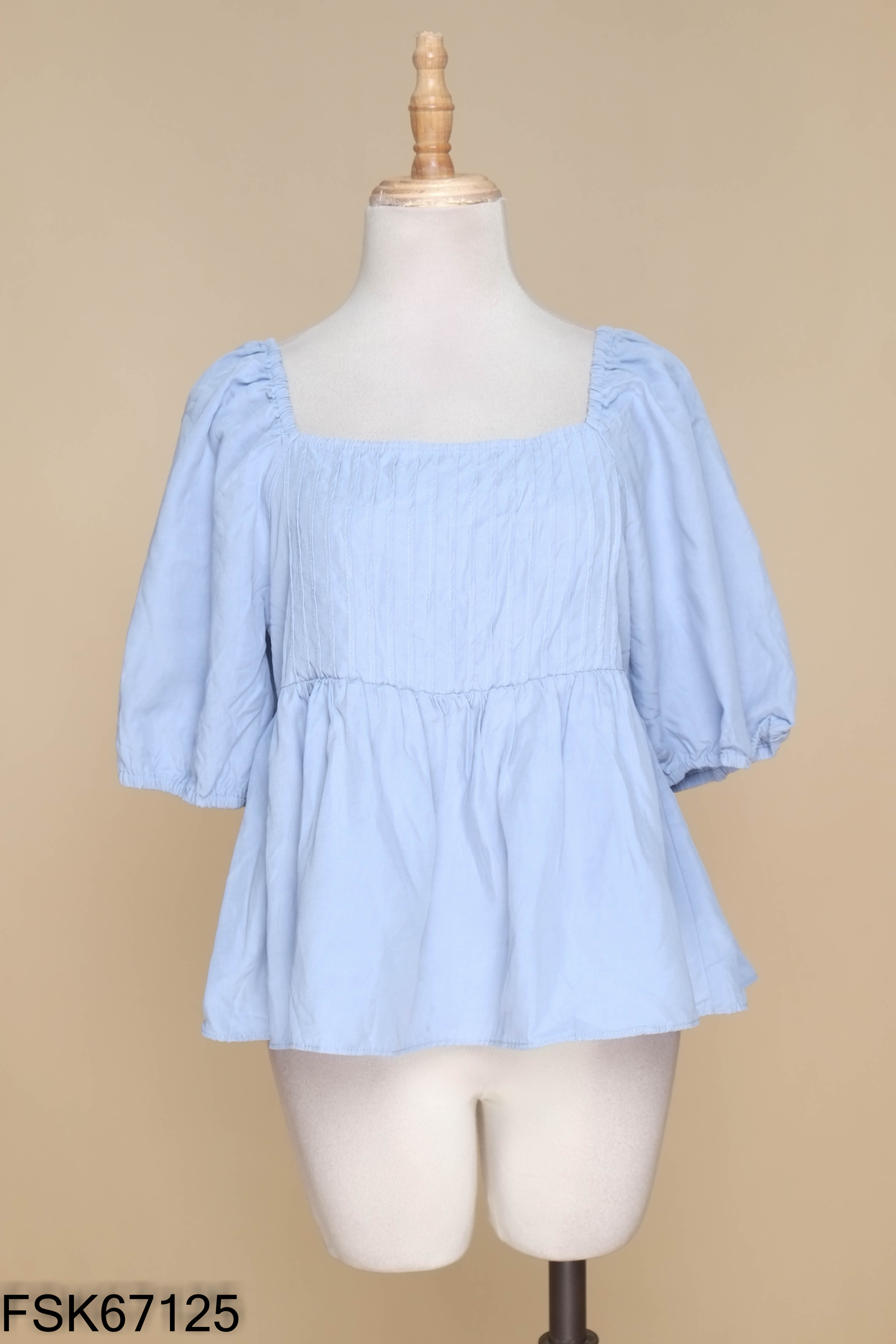 Áo xanh gấp ly tay phồng