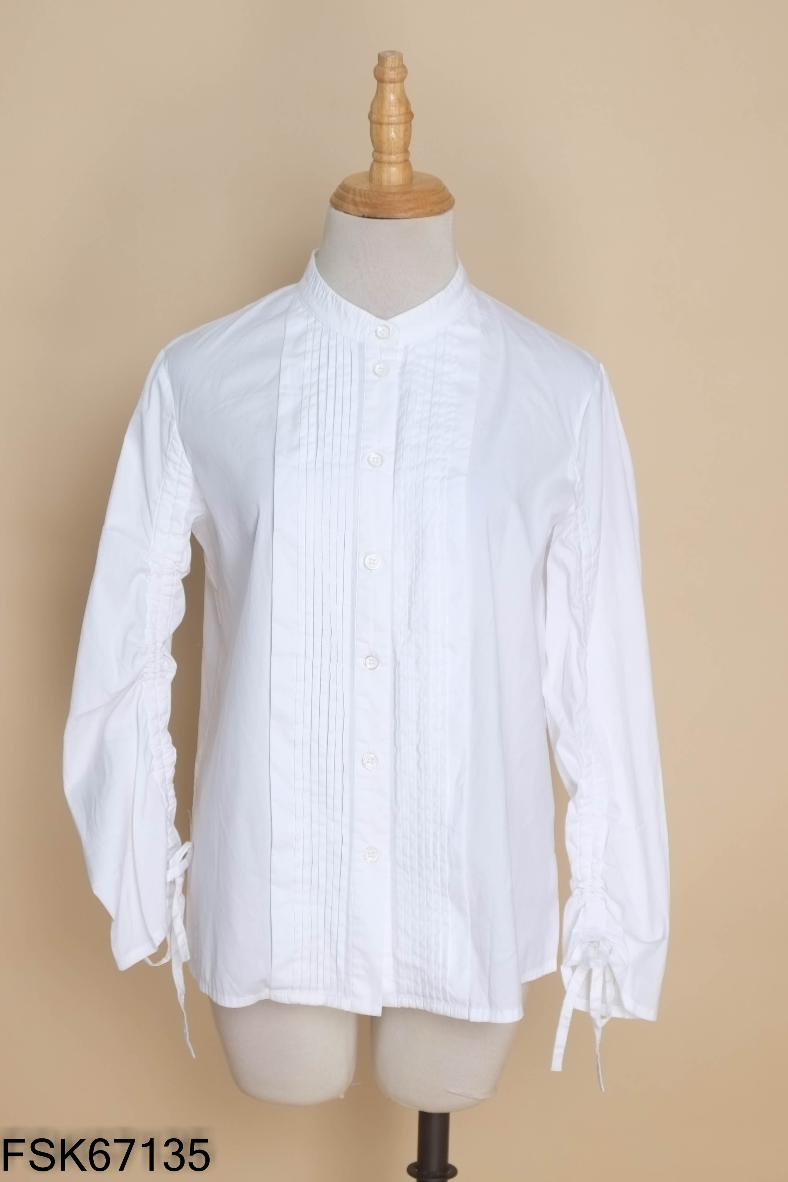 Áo trắng gấp ly