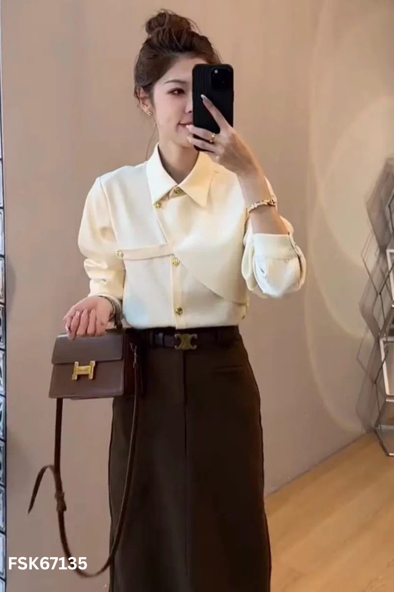 Áo be HYH vạt lệch phối khuy