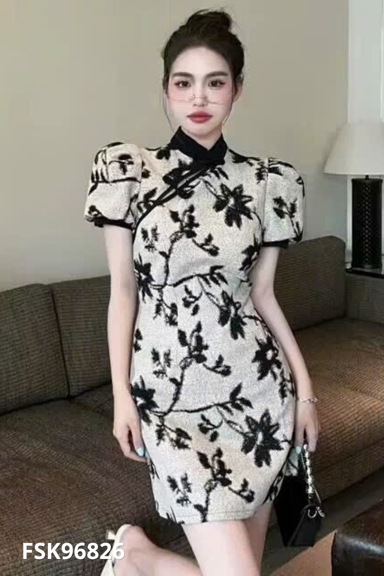 Váy be họa tiết đen