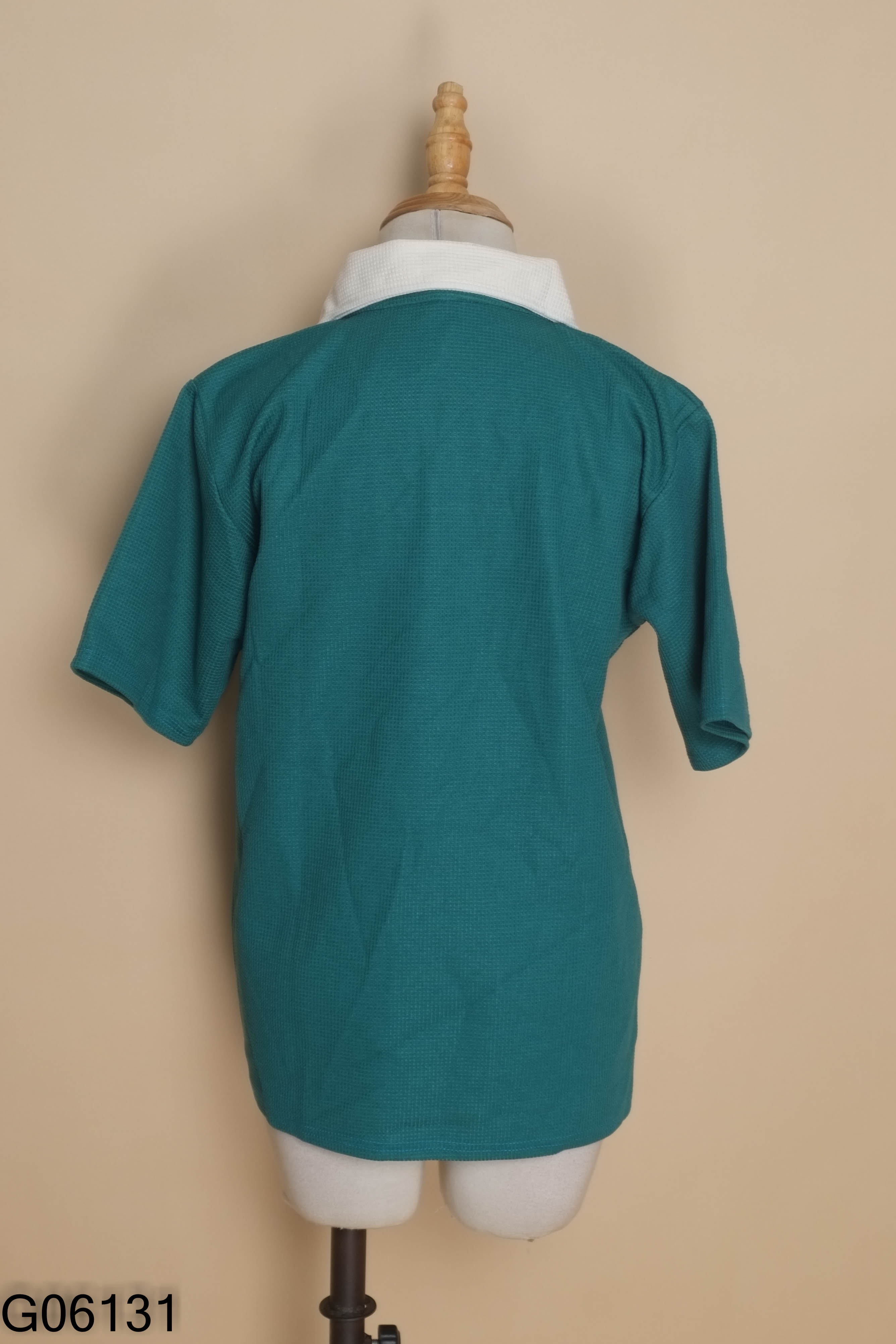 Áo polo xanh cổ be