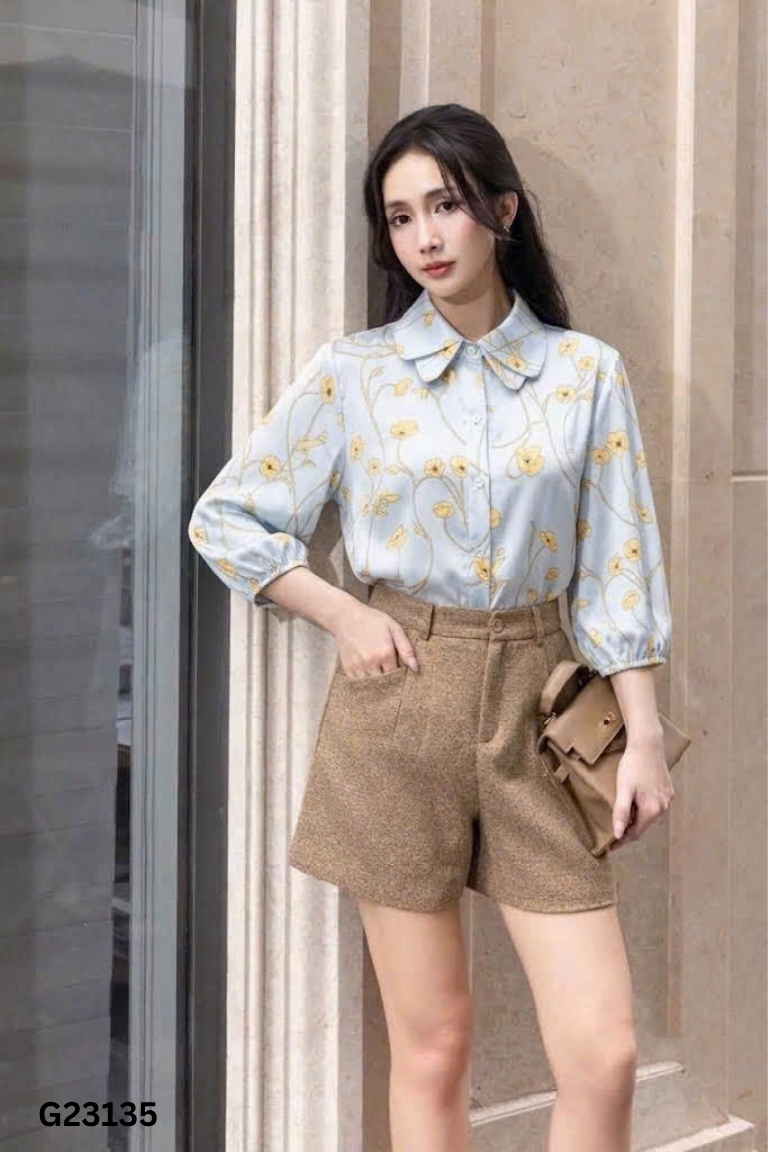 Áo sơ mi xanh NEM họa tiết vàng
