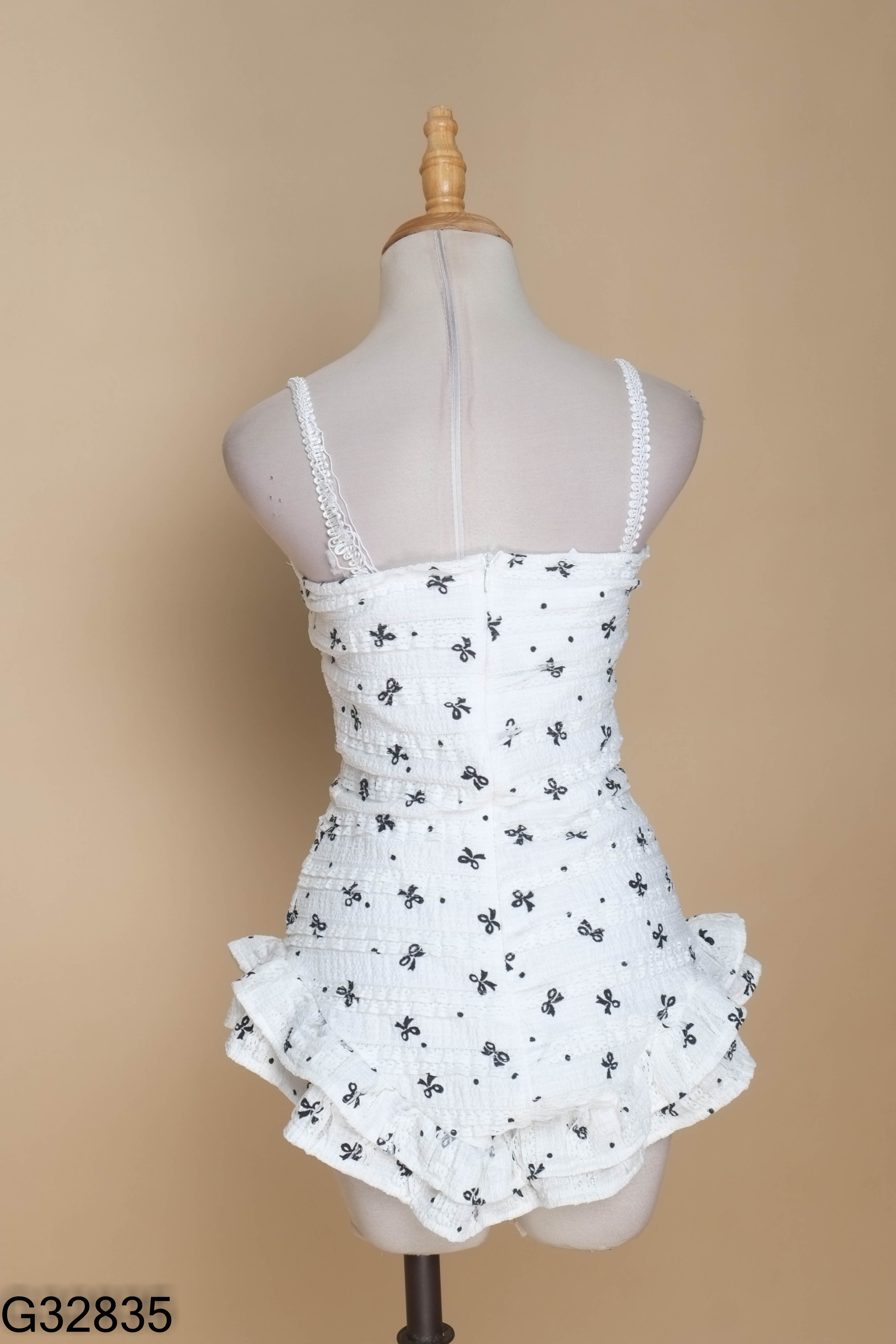 Bikini trắng 1 mảnh in nơ
