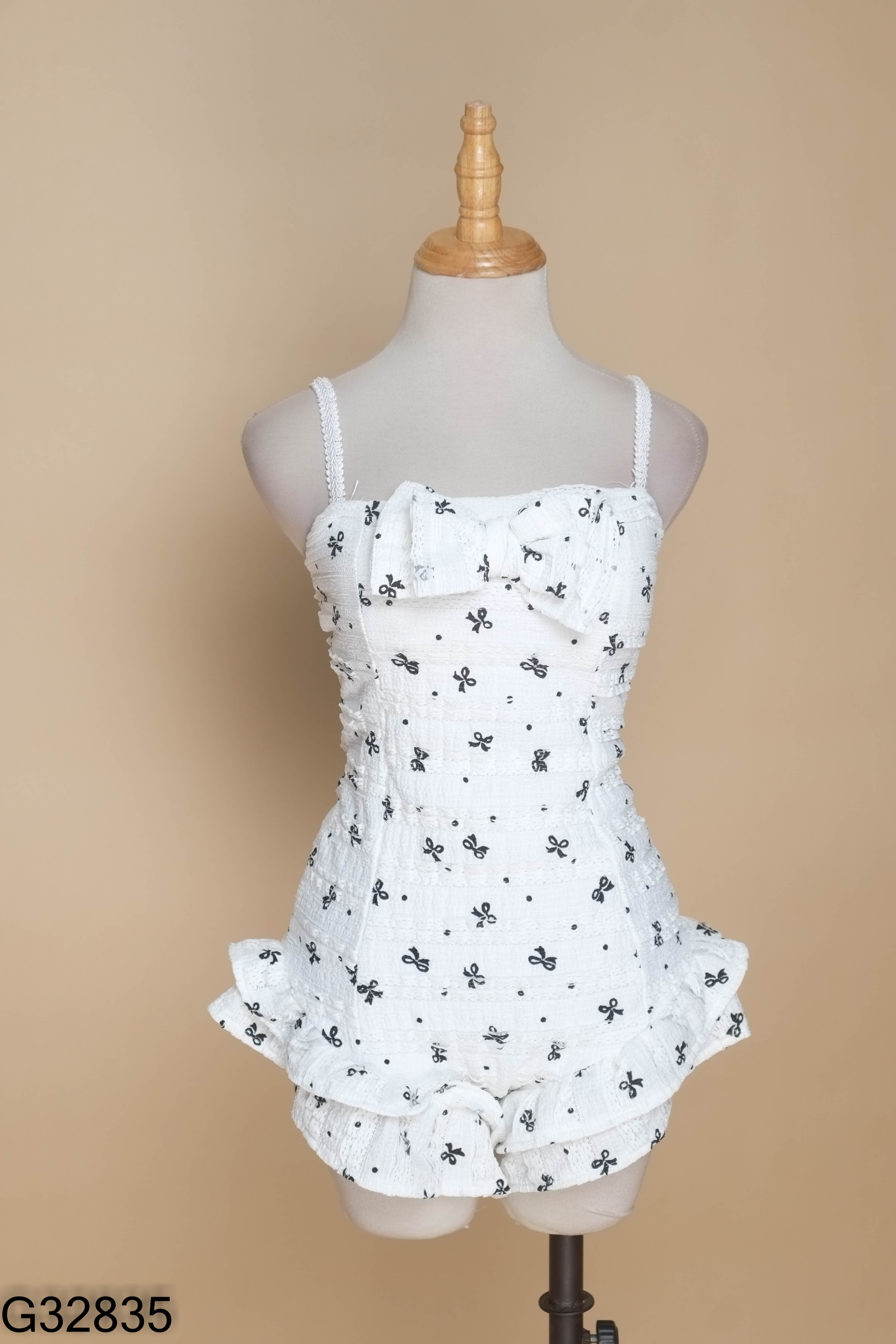 Bikini trắng 1 mảnh in nơ
