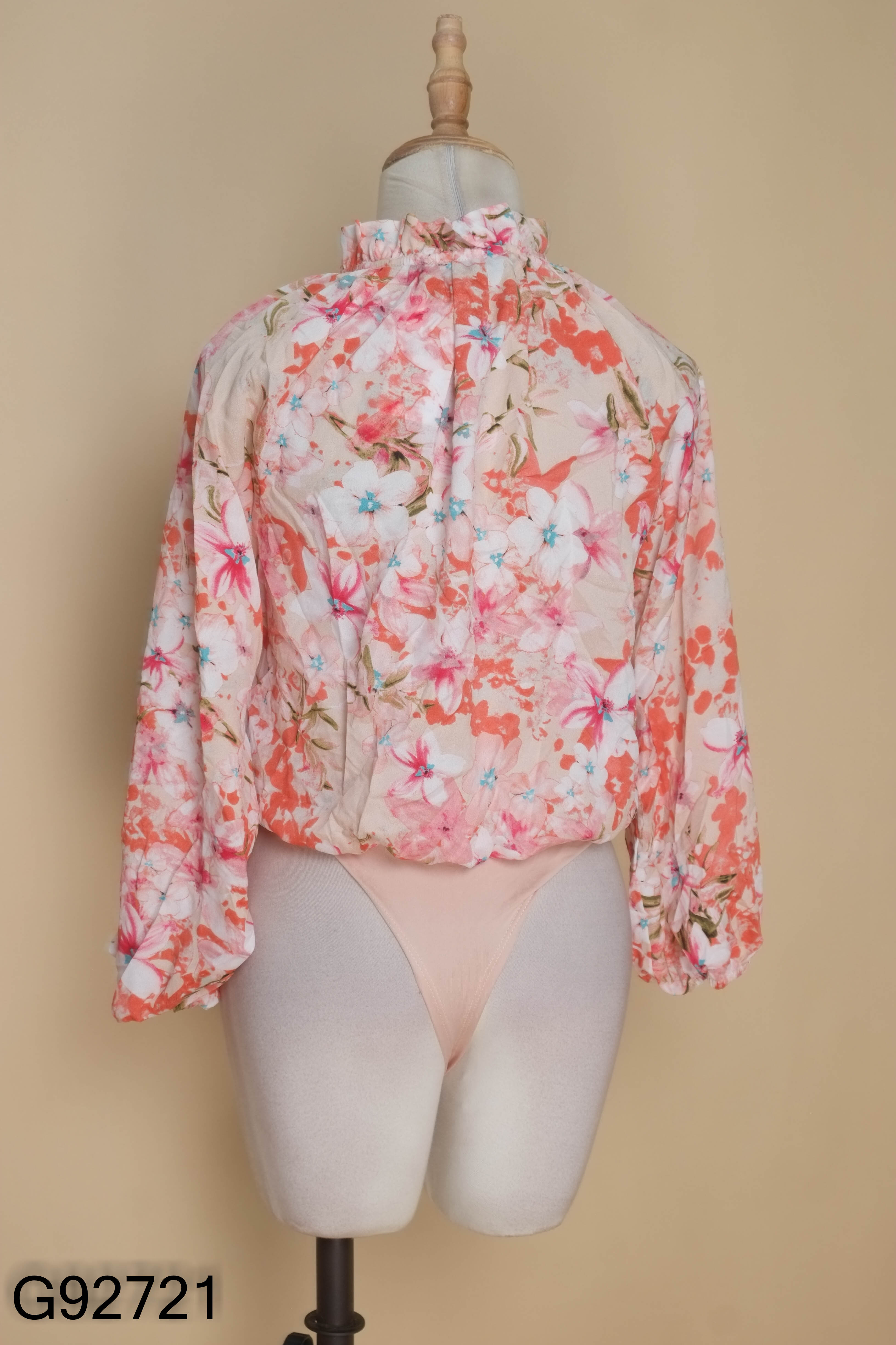 Bodysuit hồng họa tiết hoa