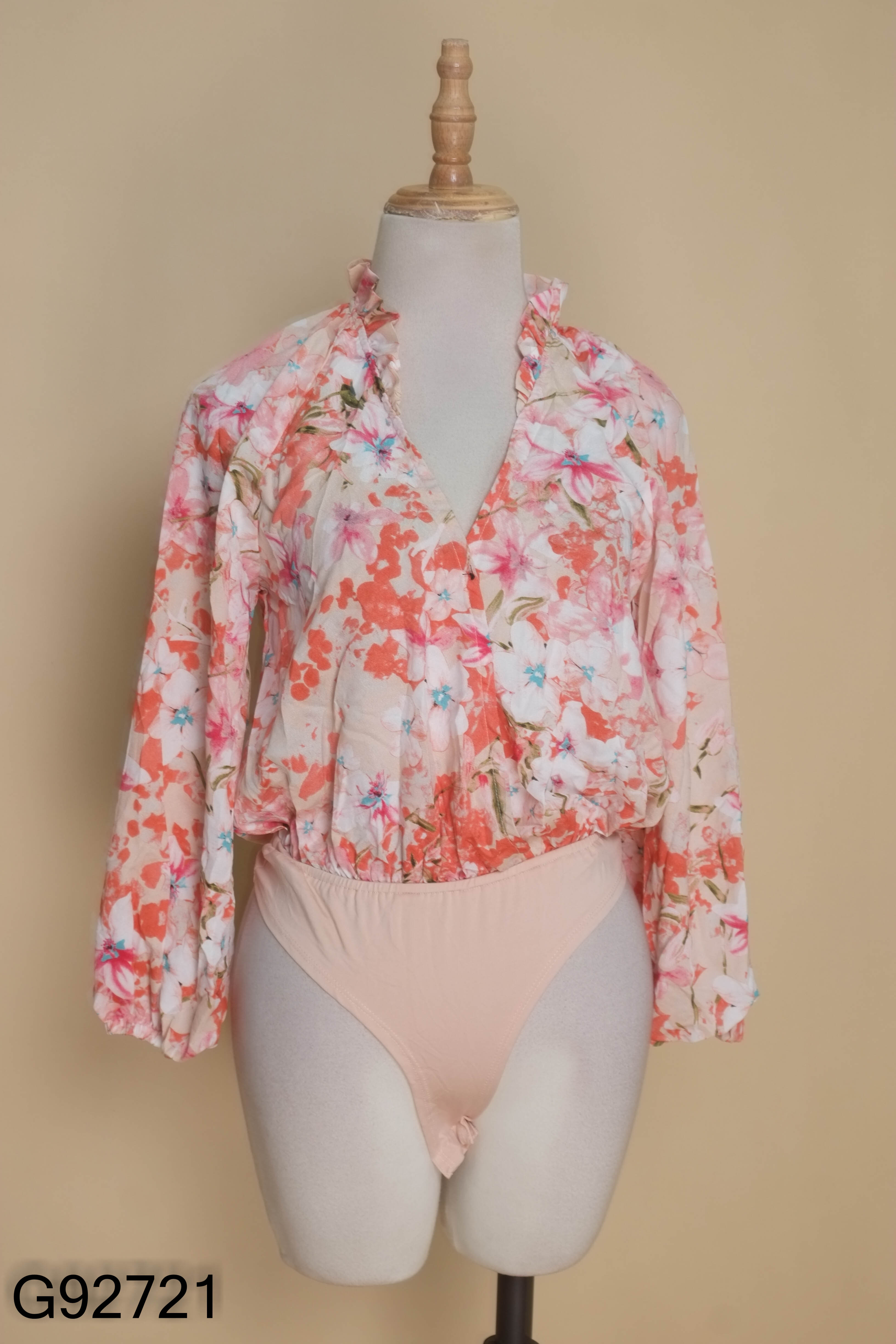 Bodysuit hồng họa tiết hoa