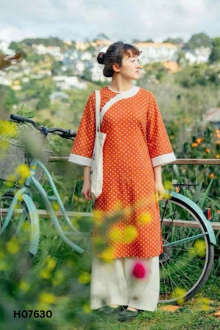 Áo dài DAISY đỏ cam chấm bi