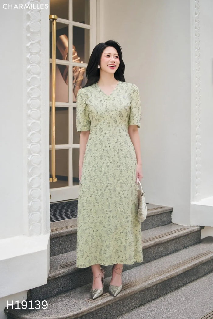 Váy xanh hoa tay phồng