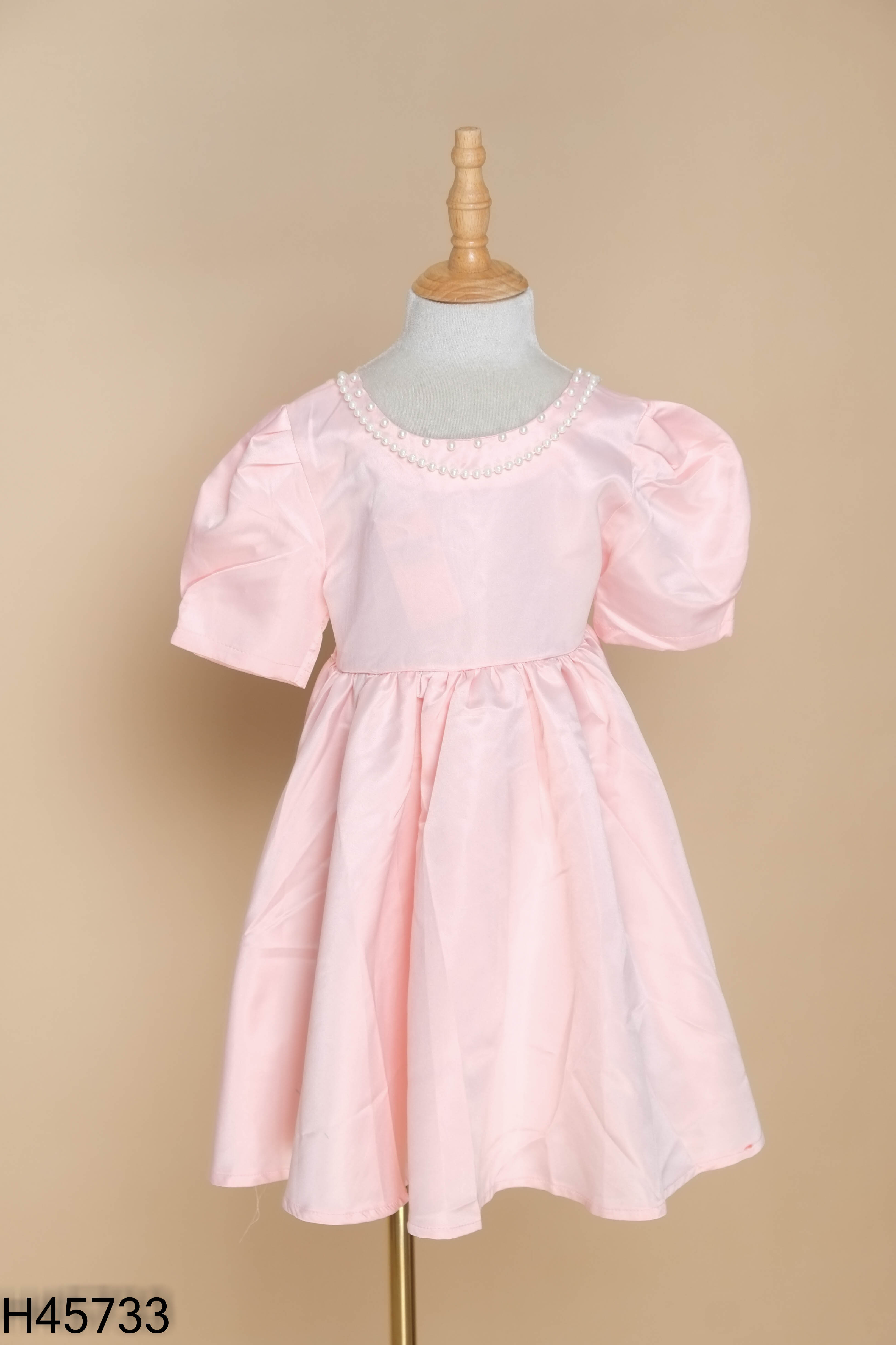 Váy hồng KIDS đính nơ dây ngọc