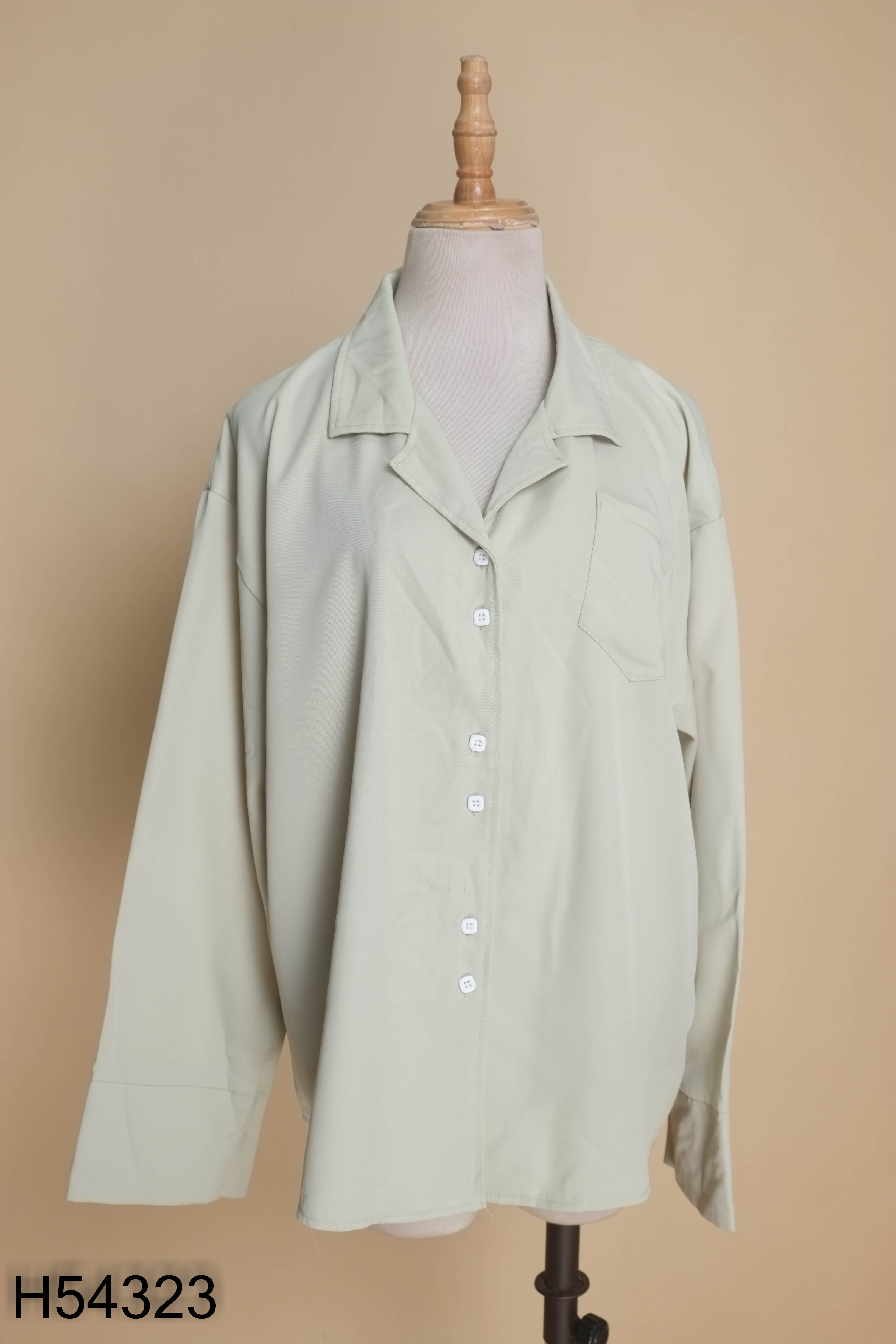 Áo sơ mi xanh trơn cổ vest