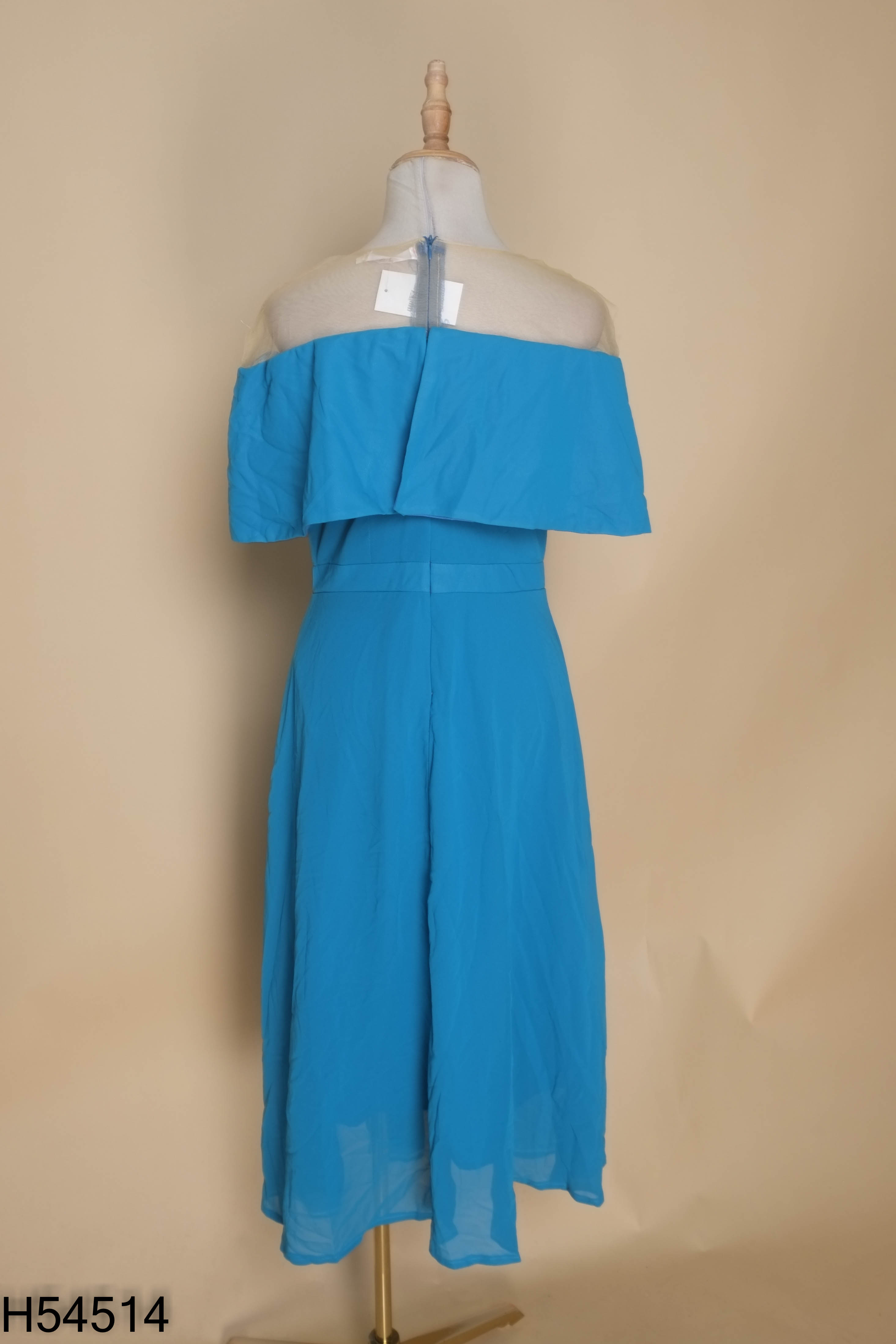 Váy xanh phối voan lưới