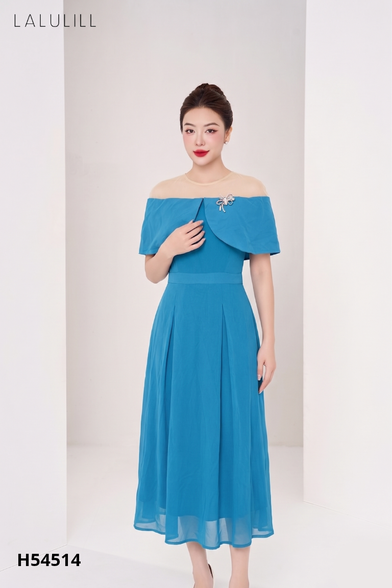 Váy xanh phối voan lưới
