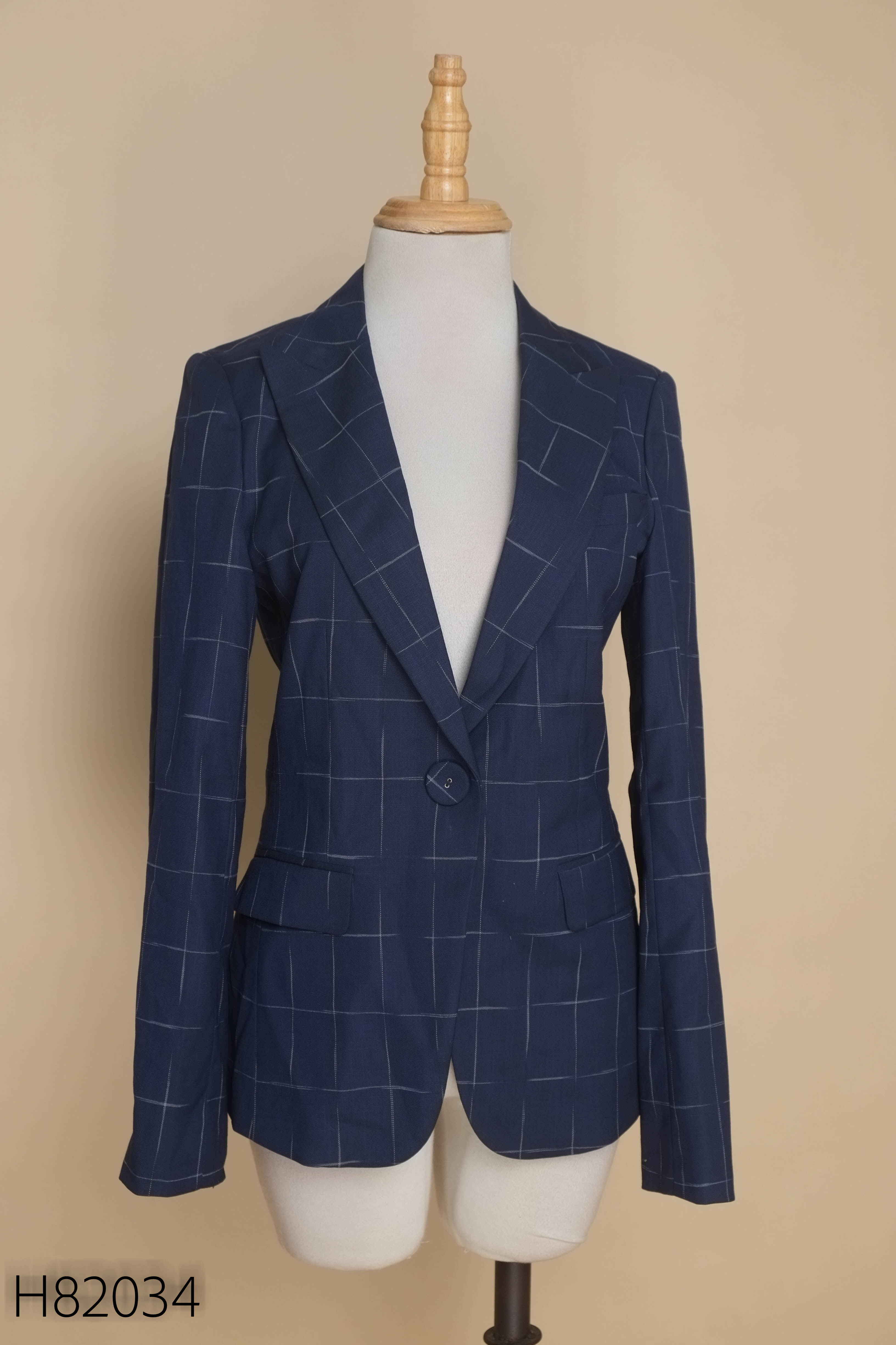 Áo vest xanh phối kẻ trắng