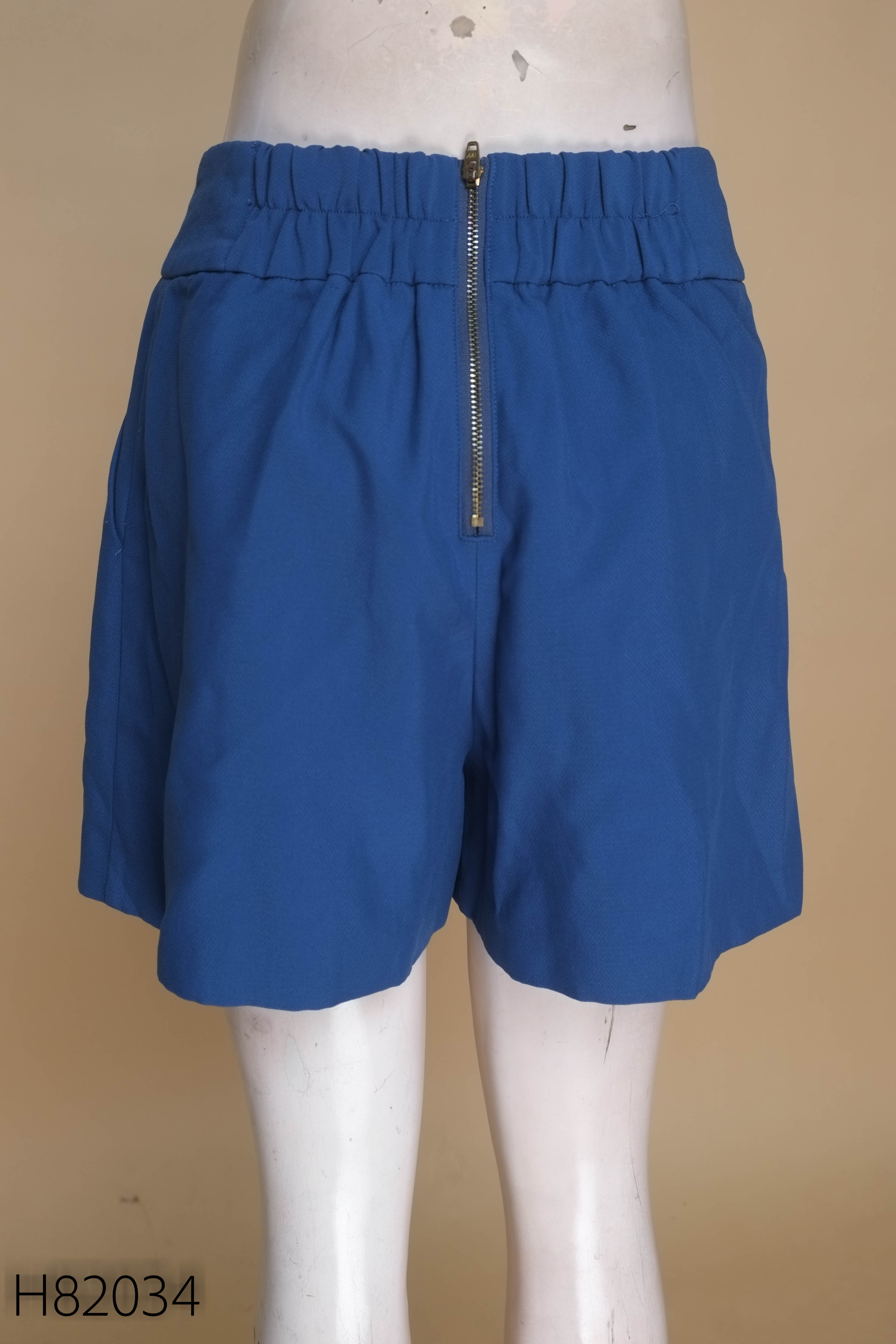 Quần shorts xanh kéo khóa